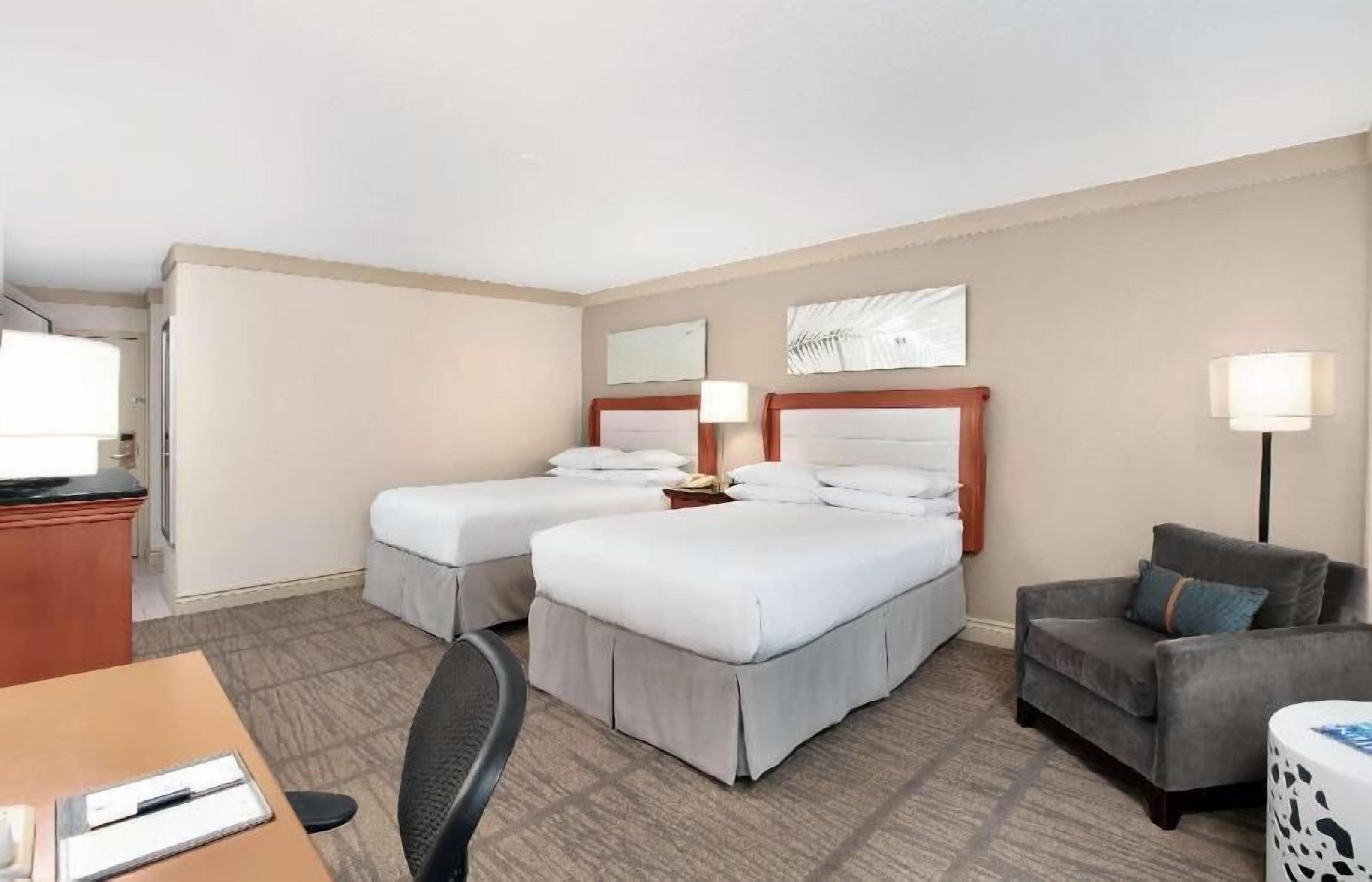 Premium bedding, down duvets, pillow-top beds, in-room safe