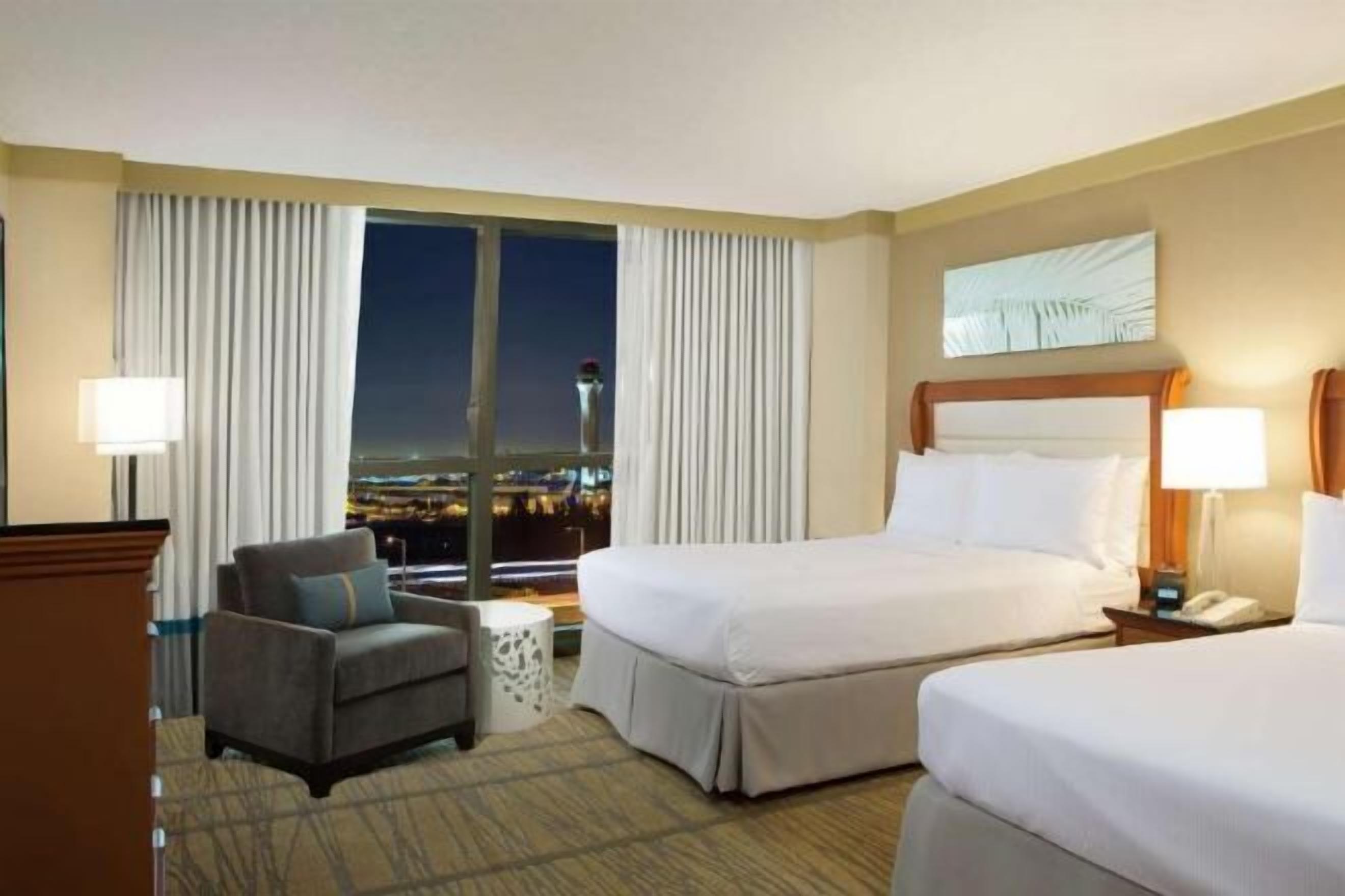 Premium bedding, down comforters, pillowtop beds, in-room safe