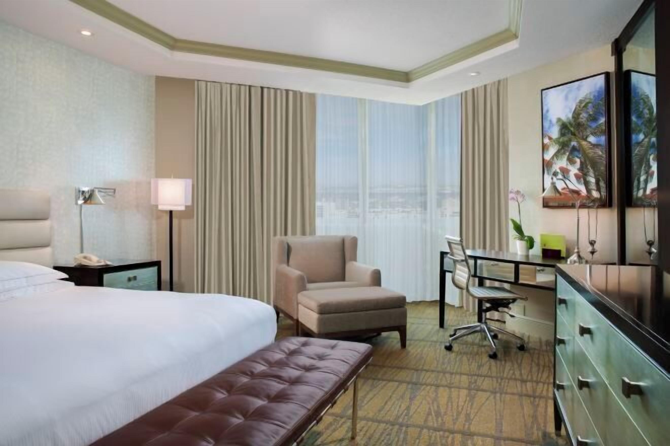 Premium bedding, down comforters, pillowtop beds, in-room safe