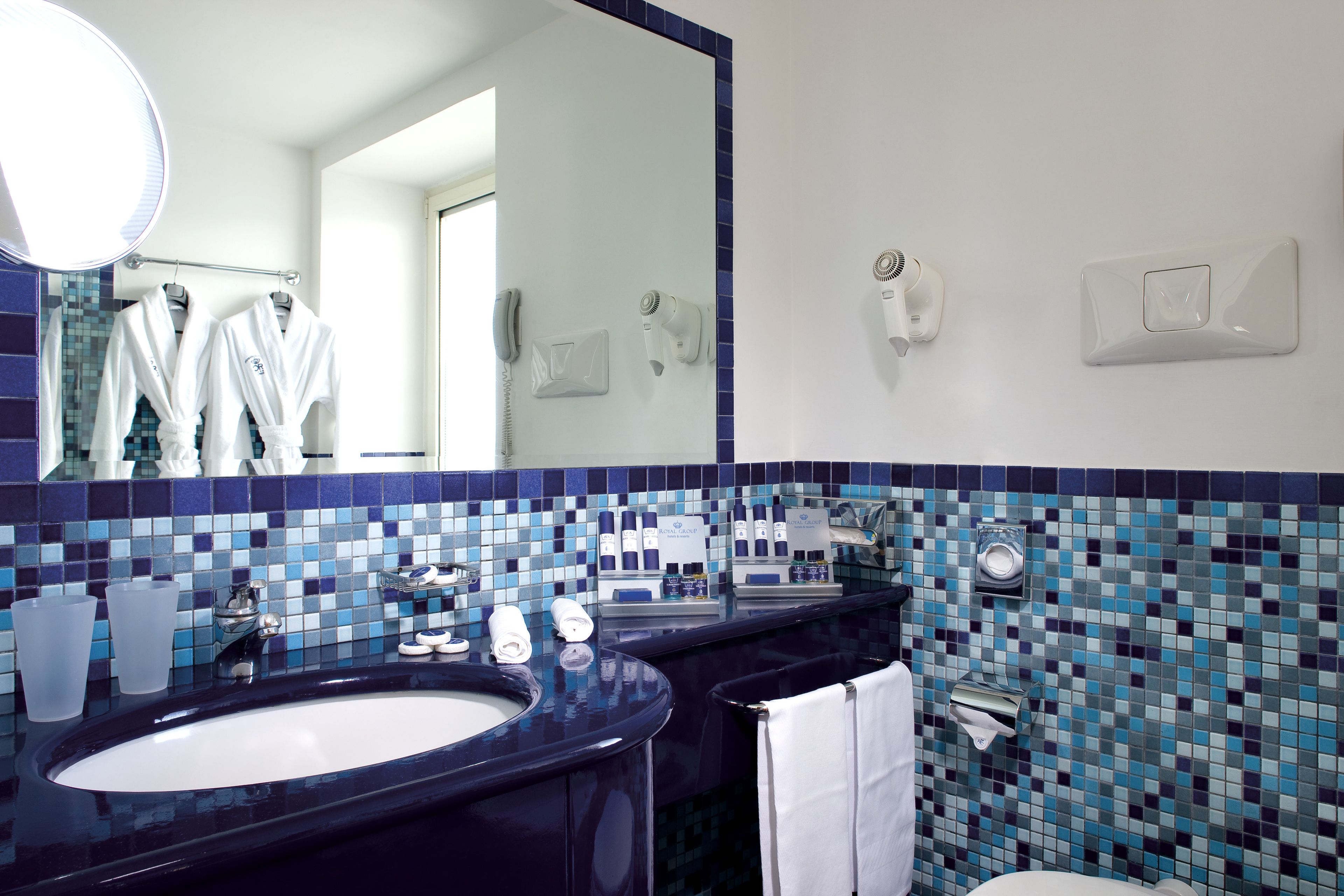 classic double room | bathroom | rainfall showerhead, free toiletries, hair dryer, slippers