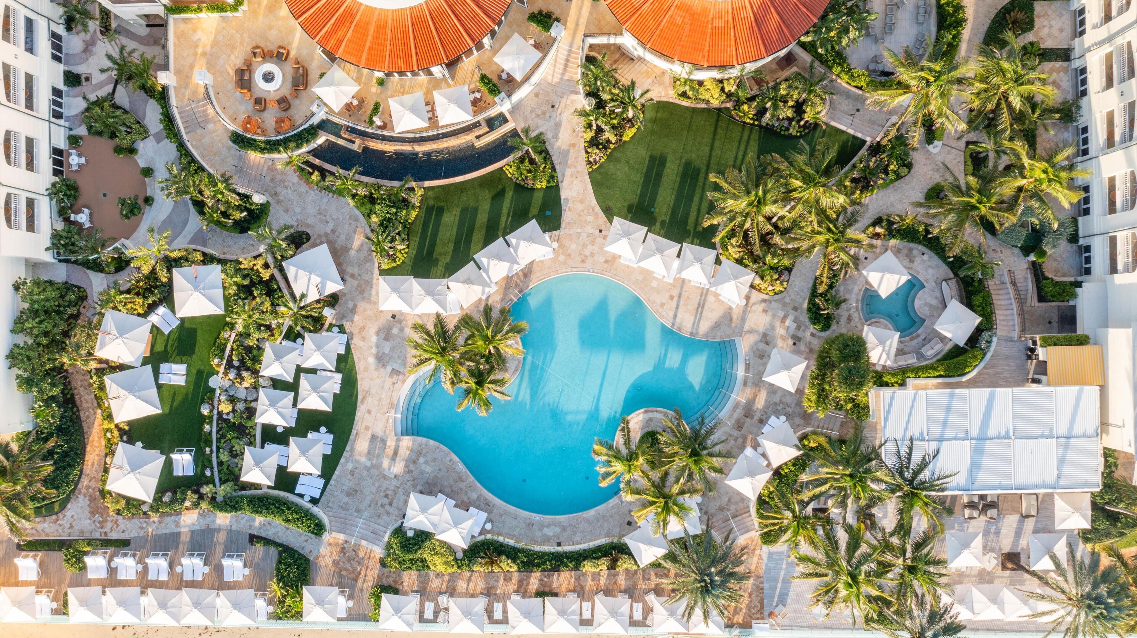 2 outdoor pools, pool umbrellas, pool loungers