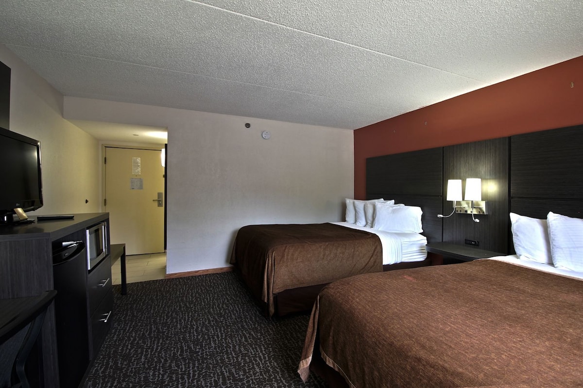 Premium bedding, down comforters, desk, laptop workspace
