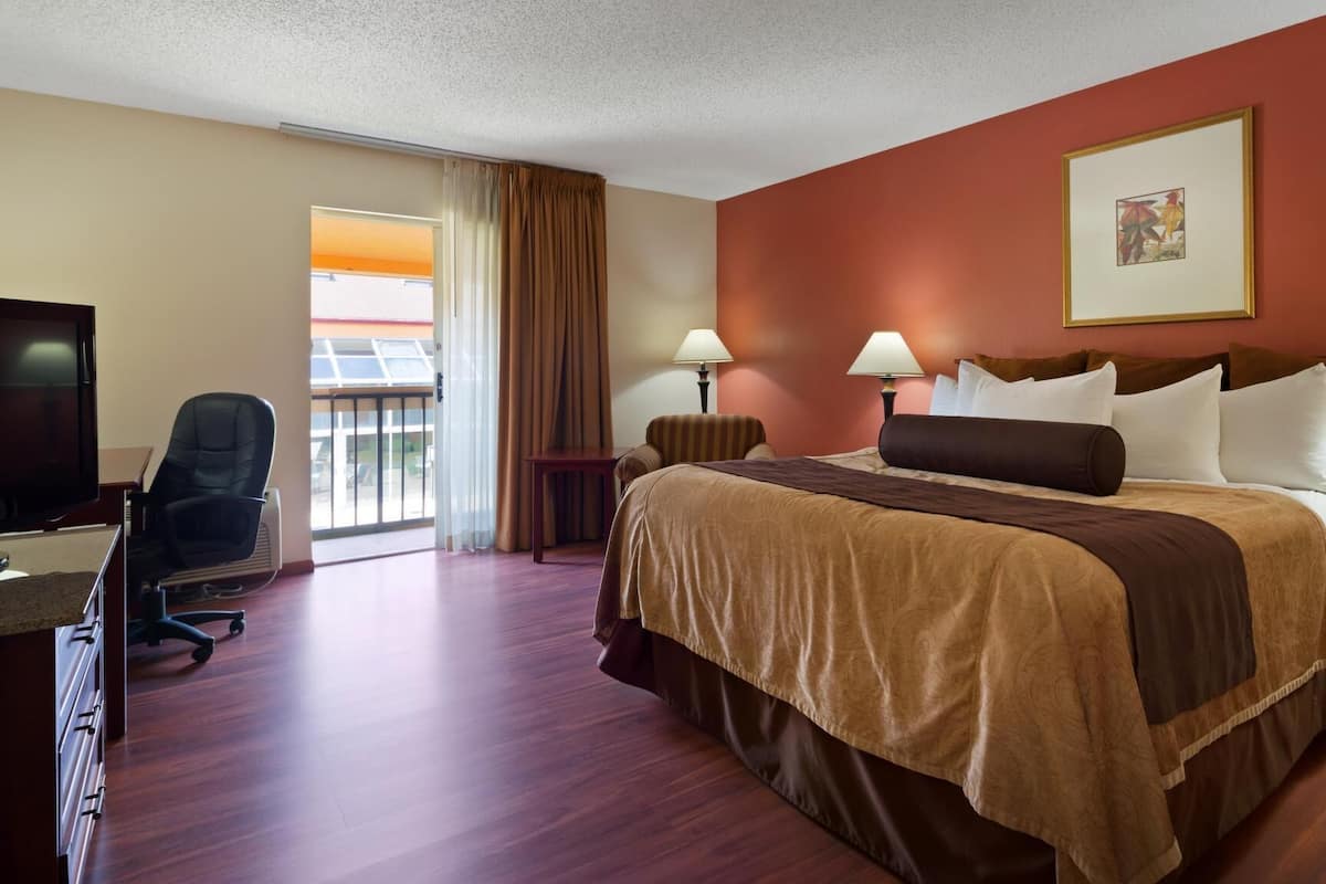 Premium bedding, down comforters, desk, laptop workspace