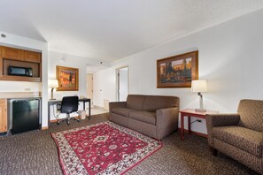 Chicago Club Suite with Balcony | Living area | 32-inch LED TV with cable channels, TV - Chicago Club Inn & Suites (Westmont)