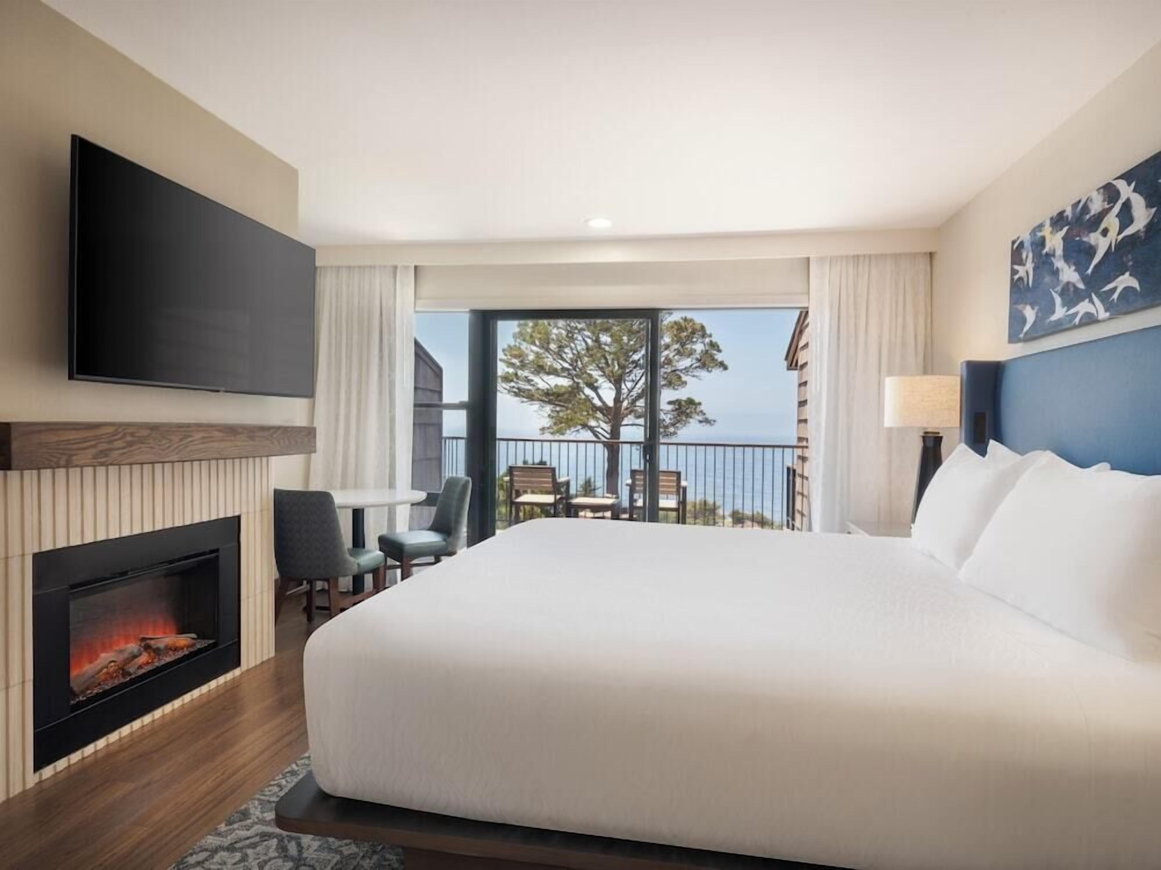 Premium bedding, down comforters, pillowtop beds, in-room safe