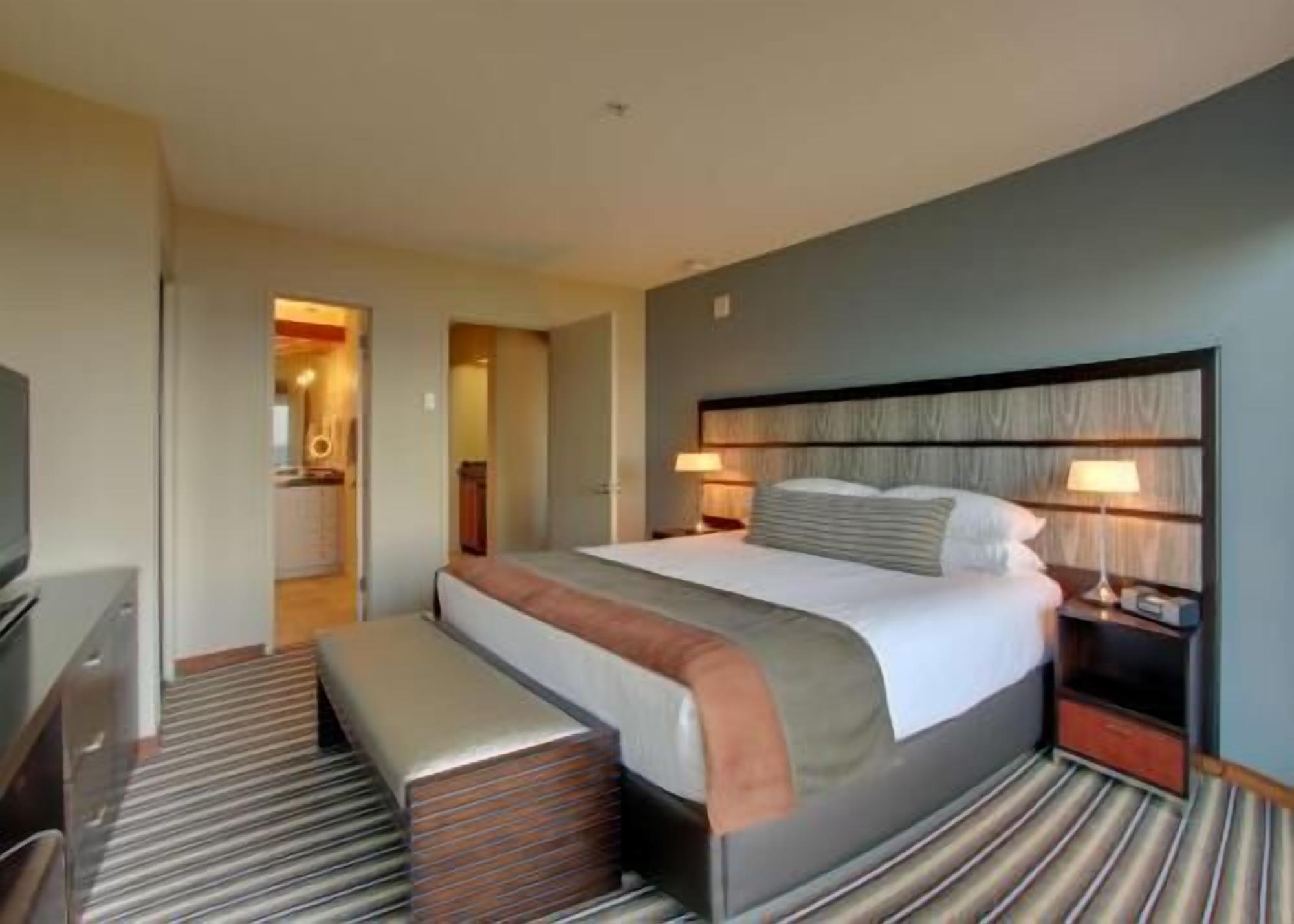 Premium bedding, down comforters, pillowtop beds, in-room safe