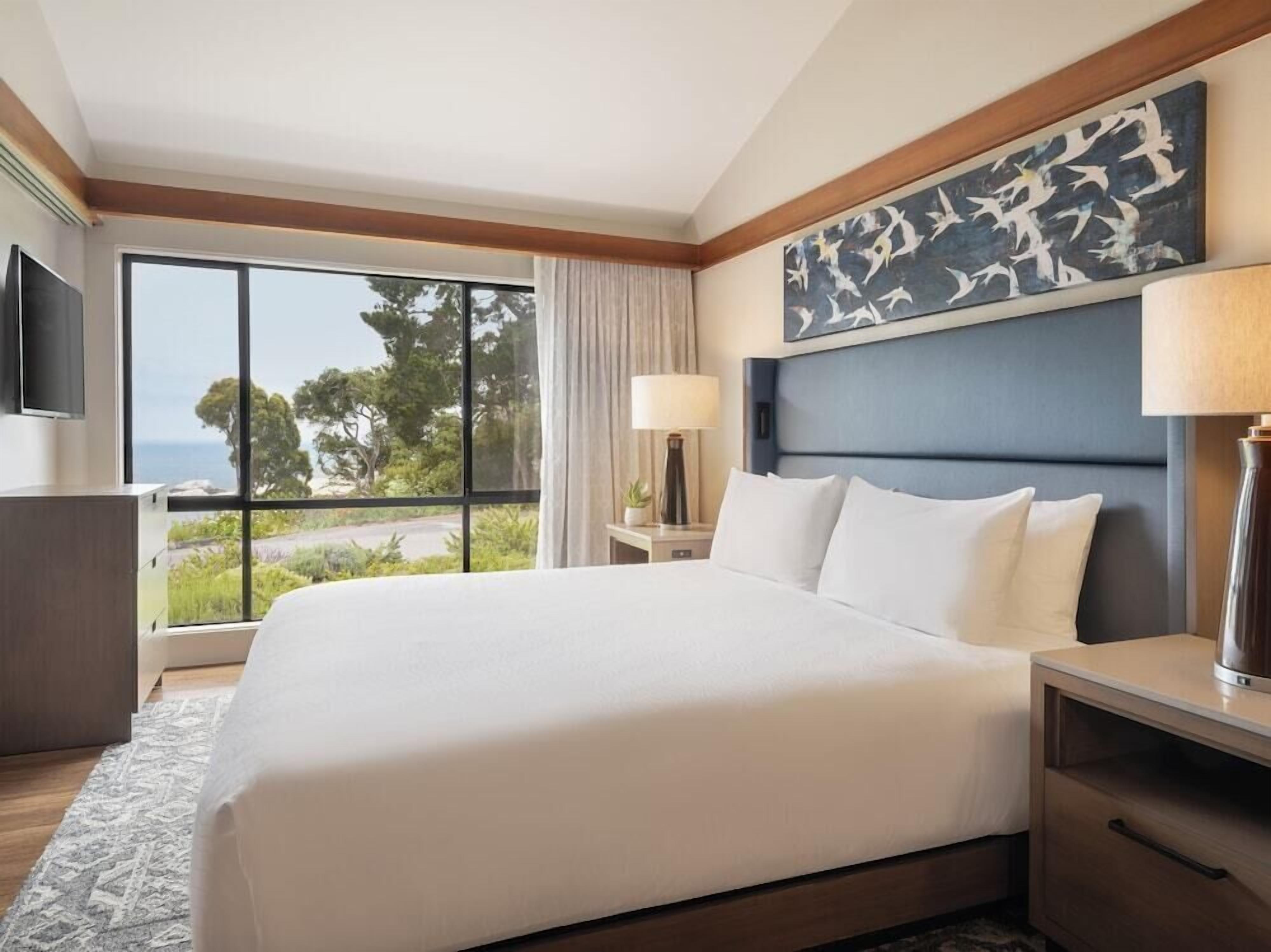 Premium bedding, down comforters, pillowtop beds, in-room safe