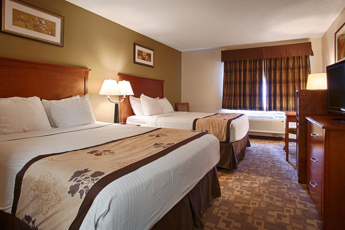 standard room, 2 queen beds, non smoking, refrigerator | premium bedding, pillow-top beds, in-room safe, desk