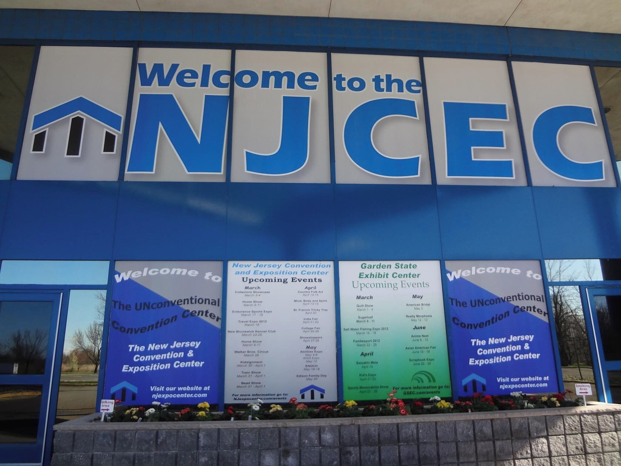 The NJCEC Welcome sign with event listings for the New Jersey Convention & Exposition Center.