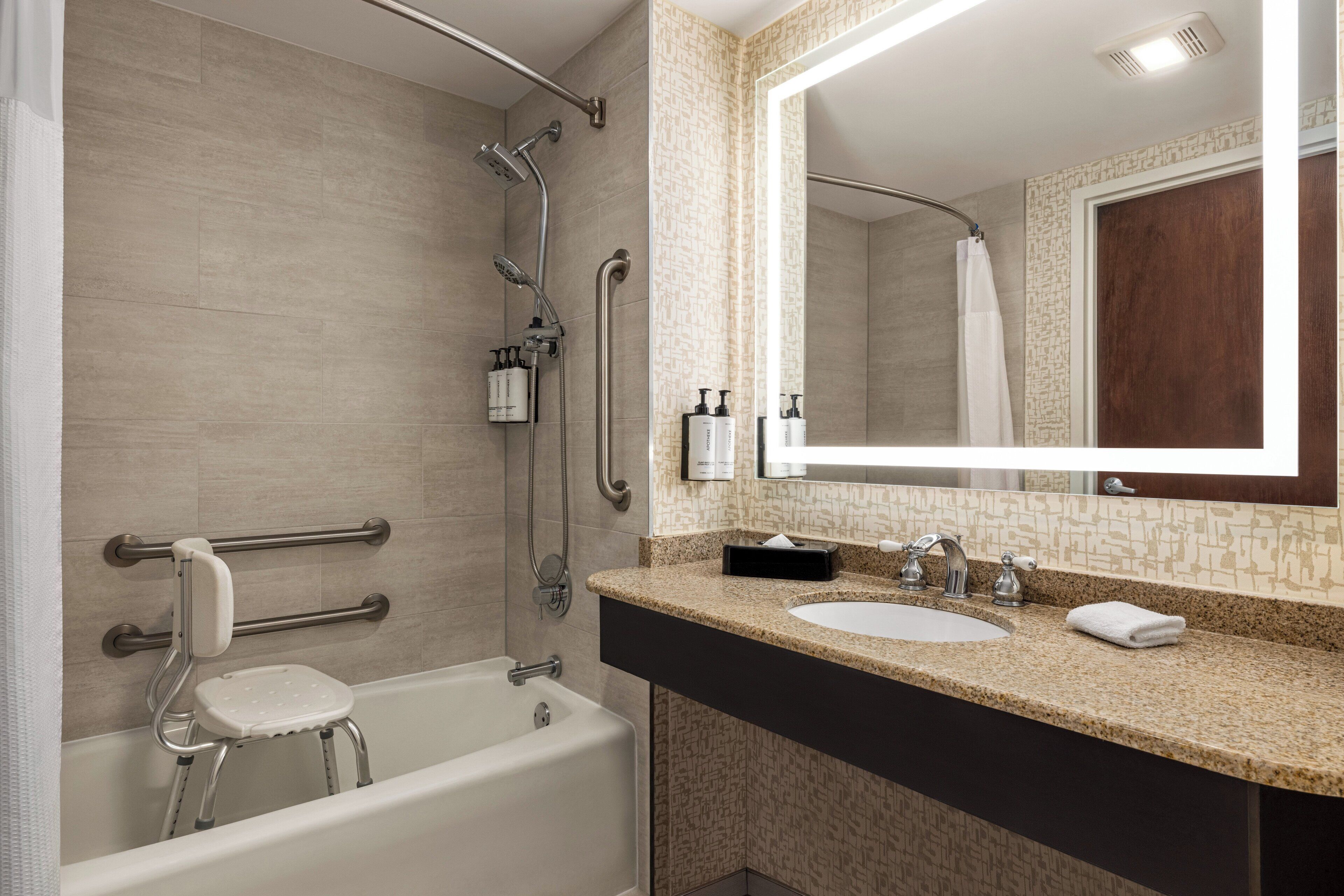 combined shower/bathtub, eco-friendly toiletries, hair dryer, towels