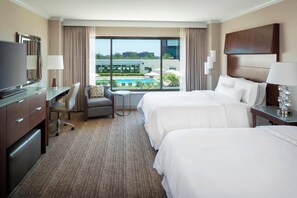 Premium bedding, down comforters, pillowtop beds, in-room safe