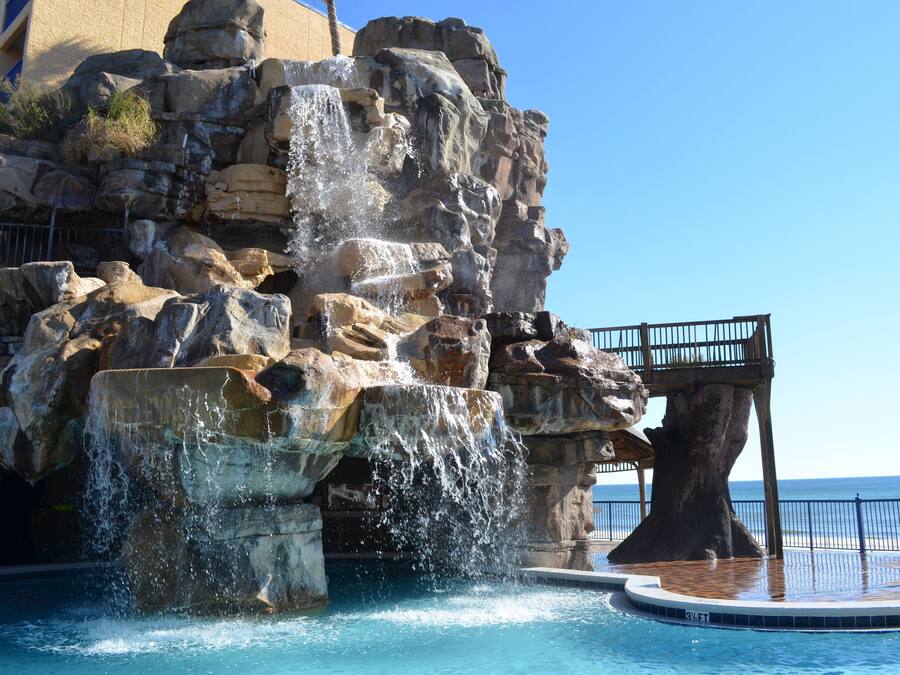 Outdoor pool, open 8:00 AM to 10:00 PM, sun loungers