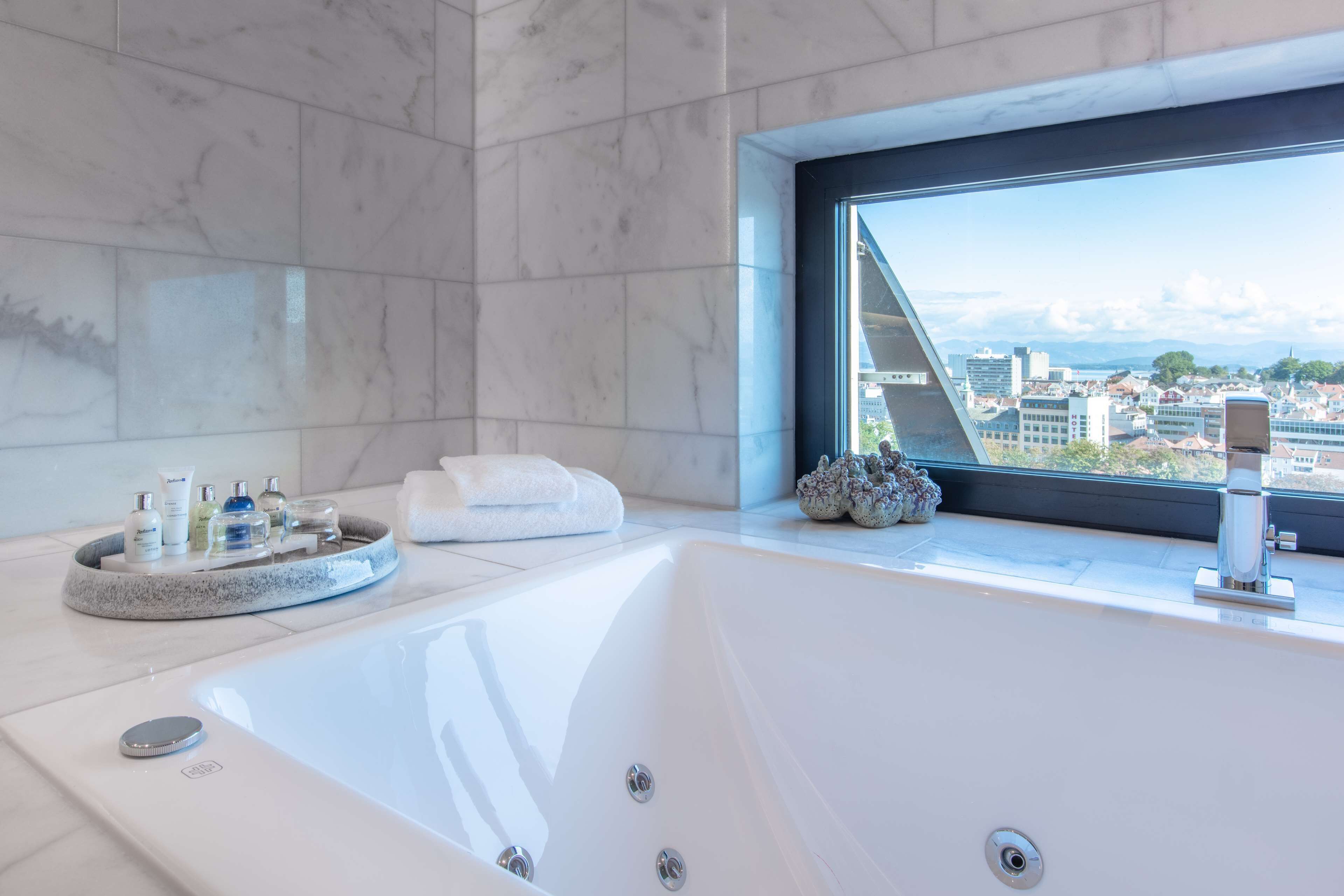 eco-friendly toiletries, hair dryer, heated floors, towels