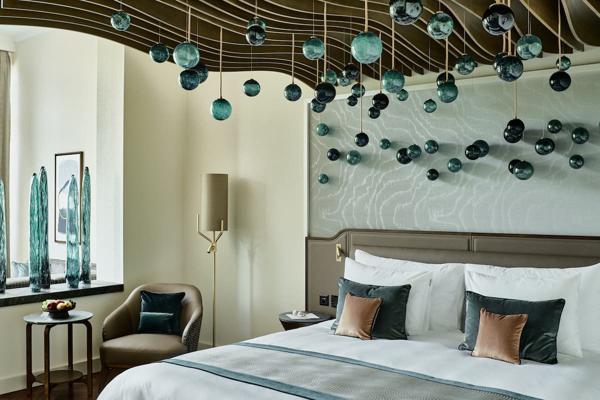 Suite Deluxe | 1 habitación, ropa de cama de alta calidad y minibar