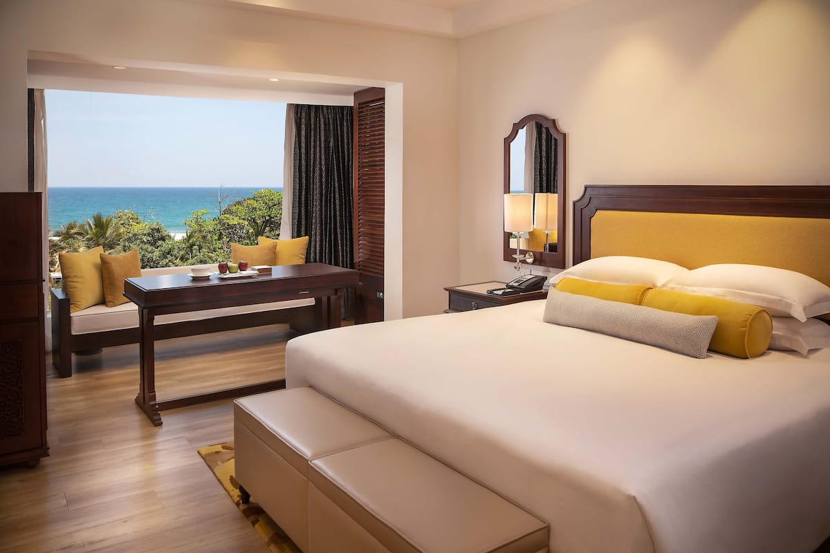 luxury room, 1 king bed, ocean view | minibar, in-room safe, desk, blackout curtains