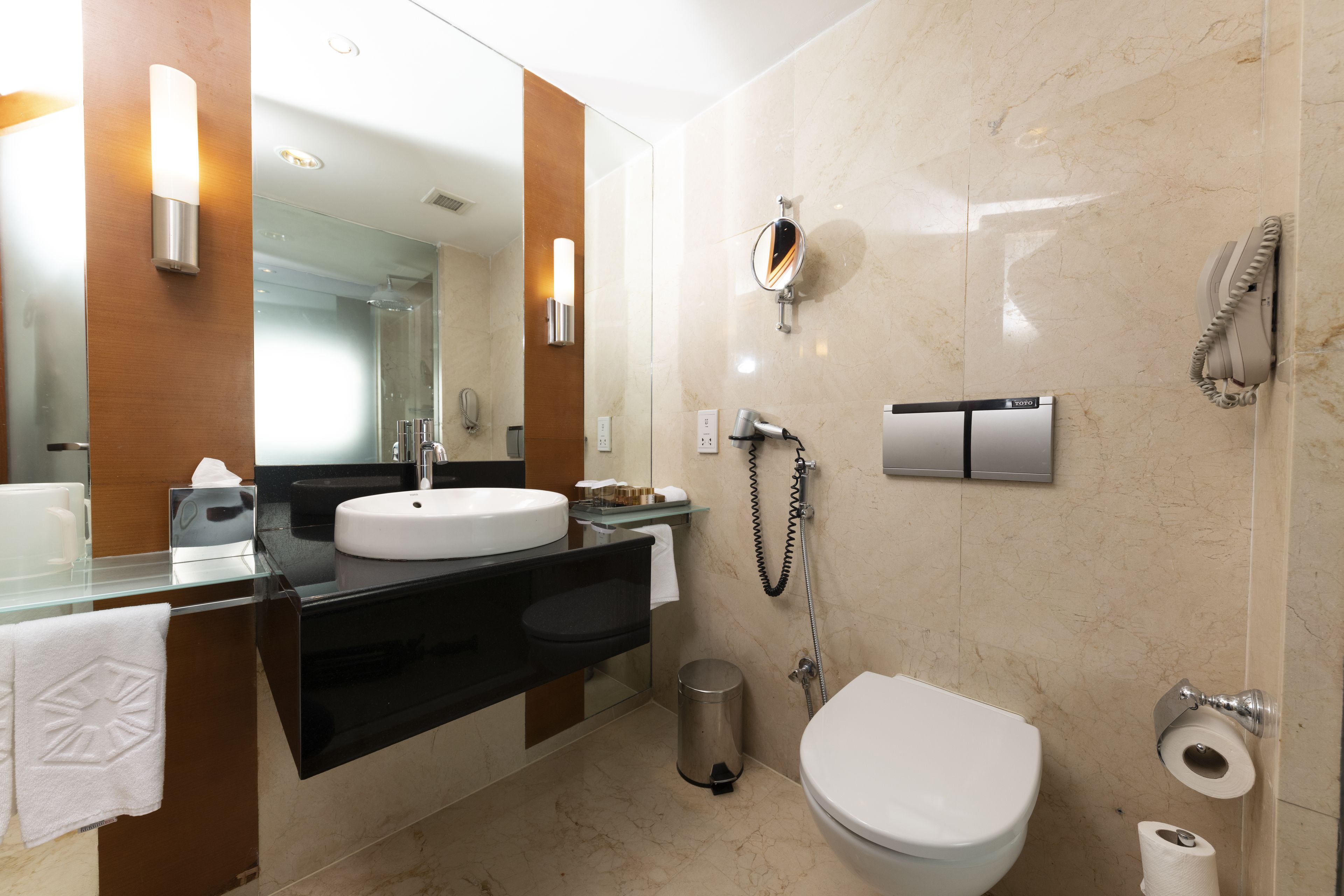 Eco-friendly toiletries, hair dryer, bathrobes, slippers