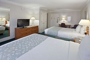 Premium bedding, pillow-top beds, desk, laptop workspace