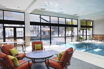 Indoor pool, outdoor pool at Courtyard by Marriott Dallas Arlington/Entertainment Dist
