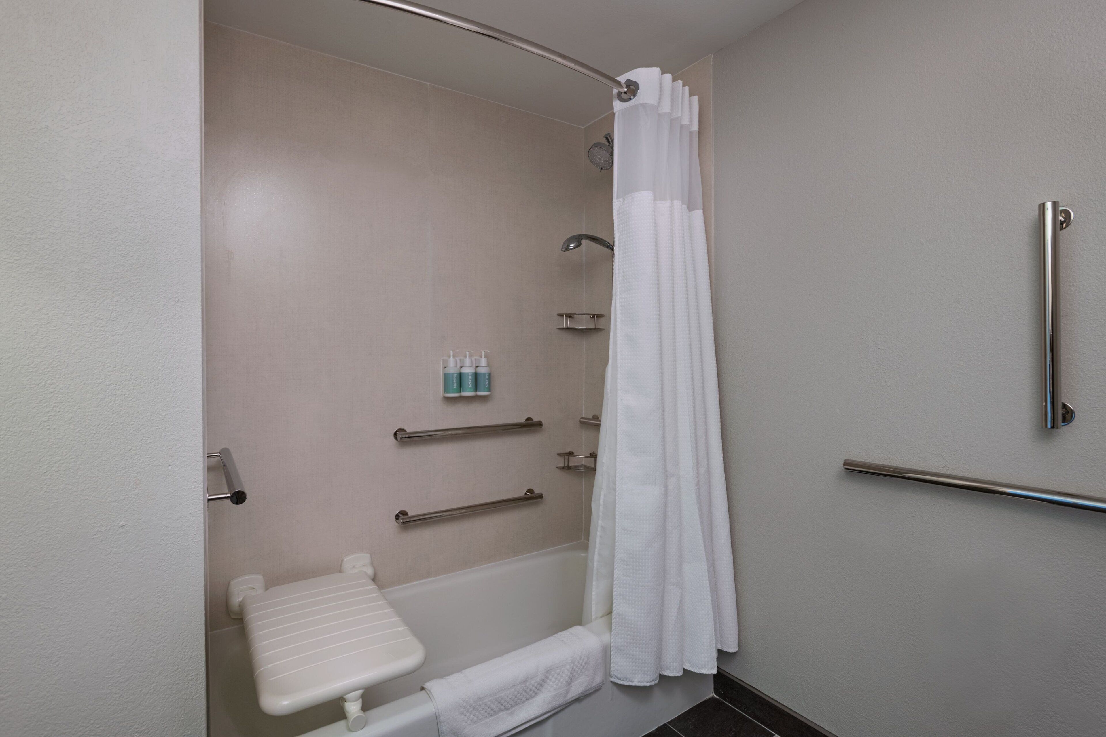 combined shower/bathtub, free toiletries, hair dryer, towels