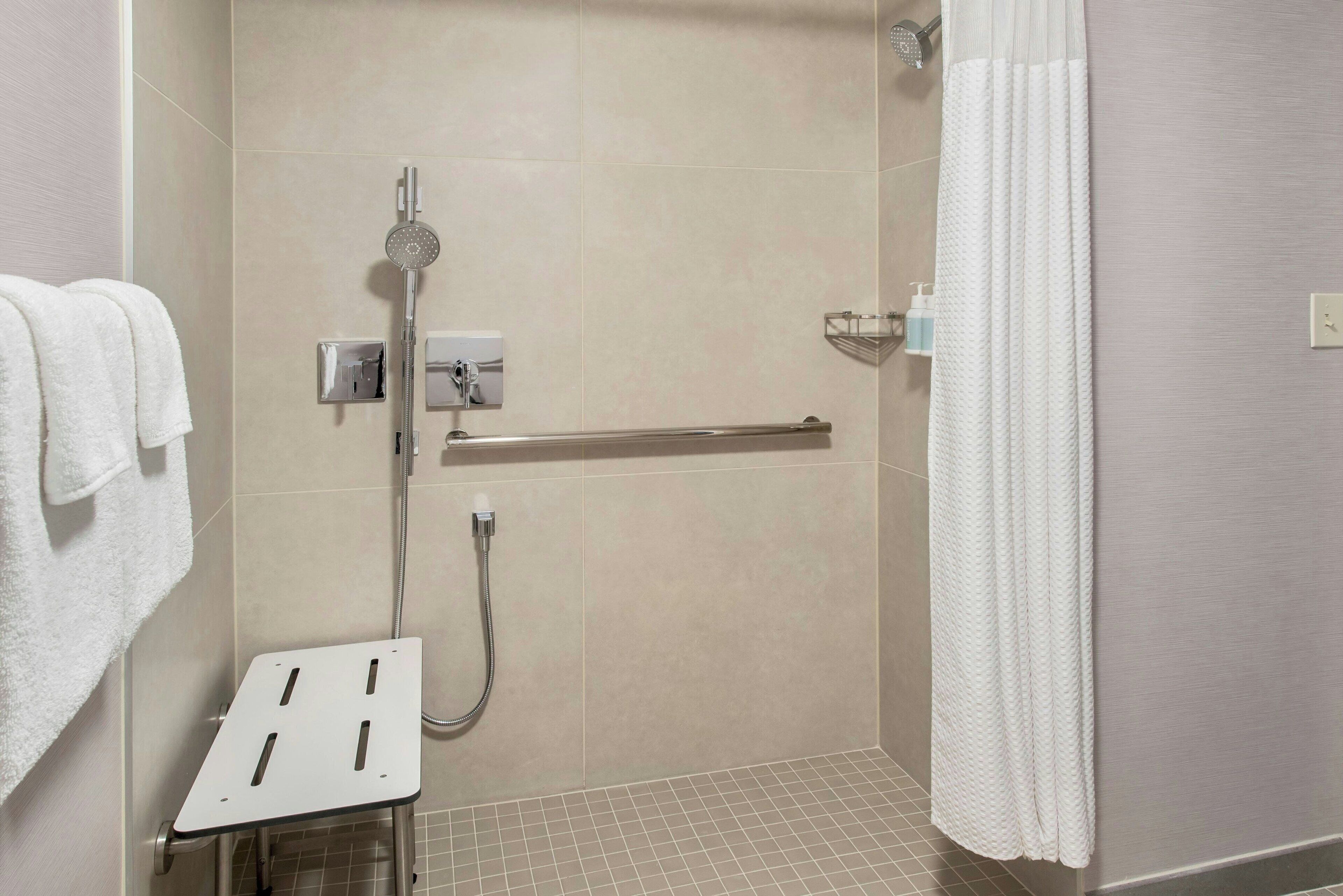 combined shower/bathtub, free toiletries, hair dryer, towels