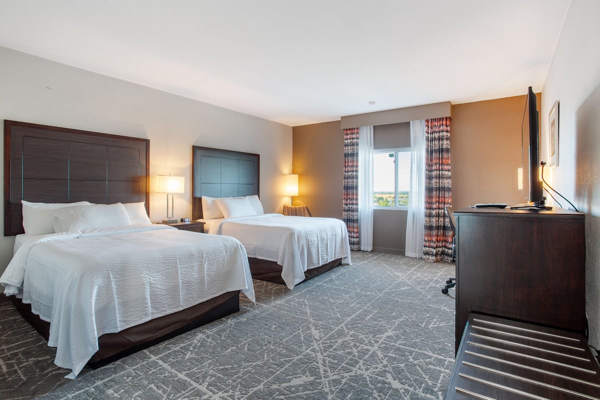 double room, 2 queen beds | blackout curtains, iron/ironing board, free wifi, bed sheets