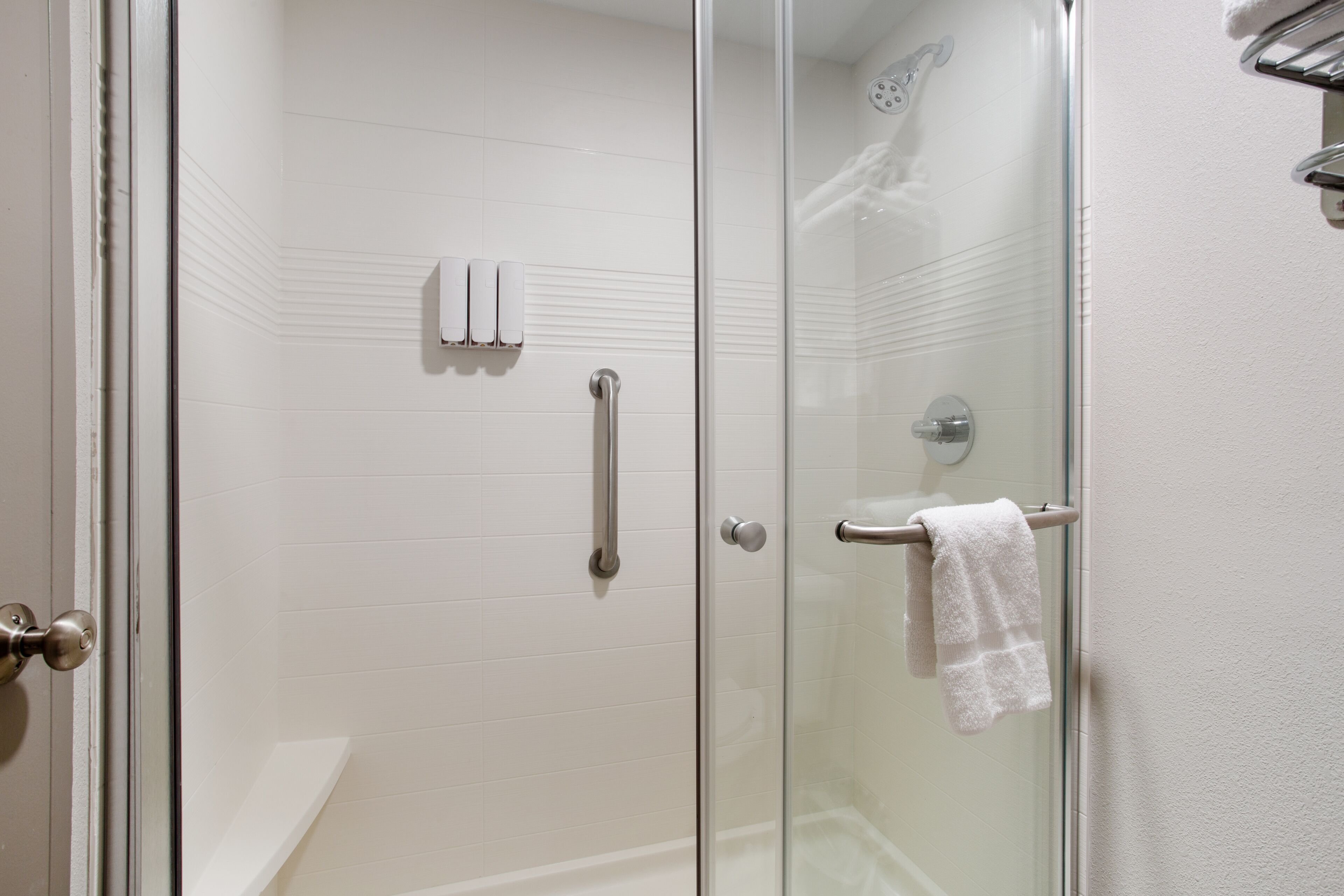 shower, eco-friendly toiletries, hair dryer, towels