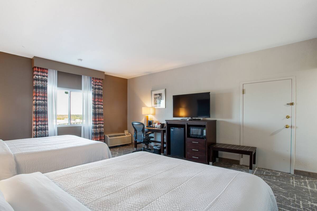 double room, 2 queen beds | blackout curtains, iron/ironing board, free wifi, bed sheets