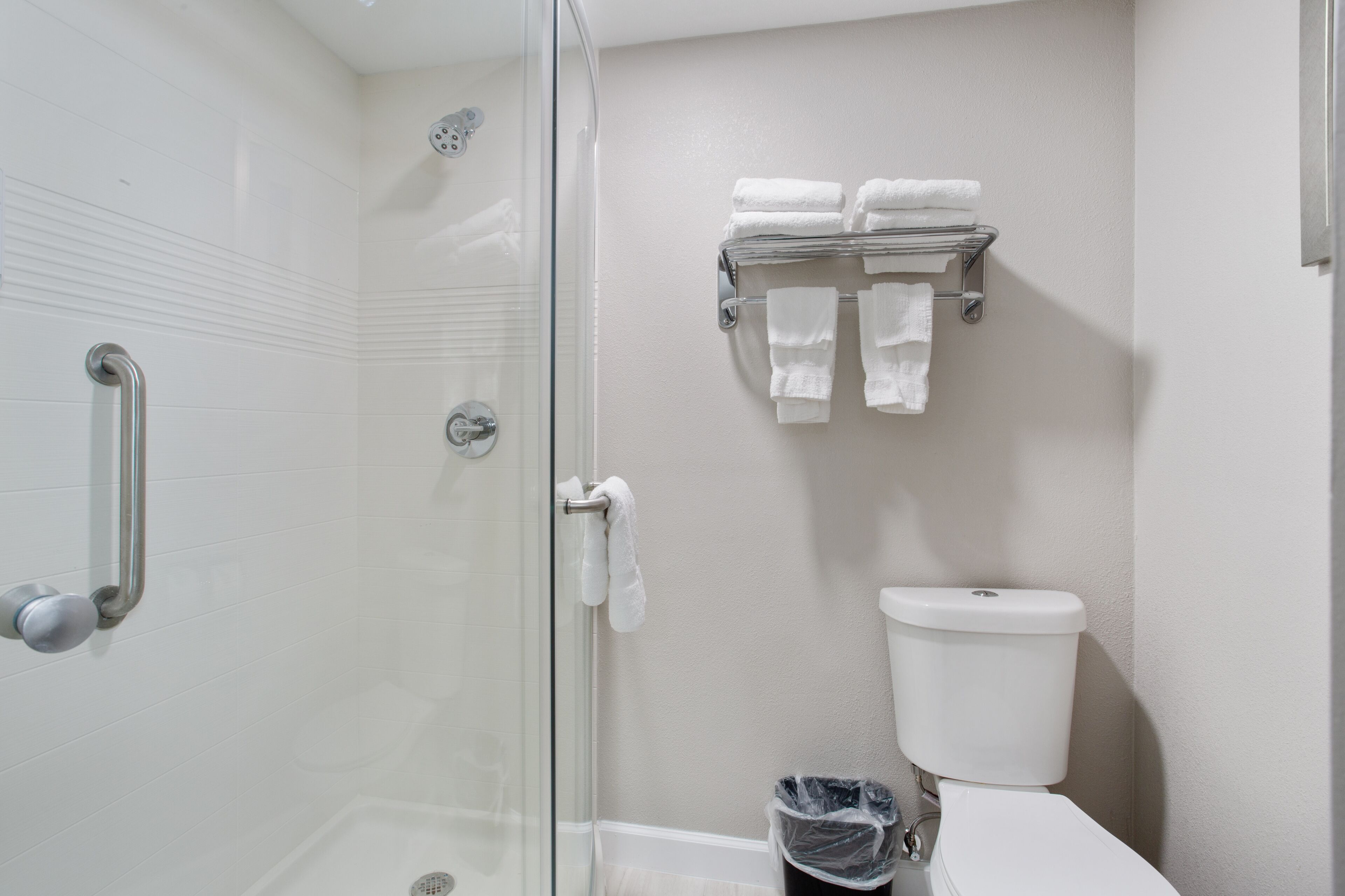 shower, eco-friendly toiletries, hair dryer, towels