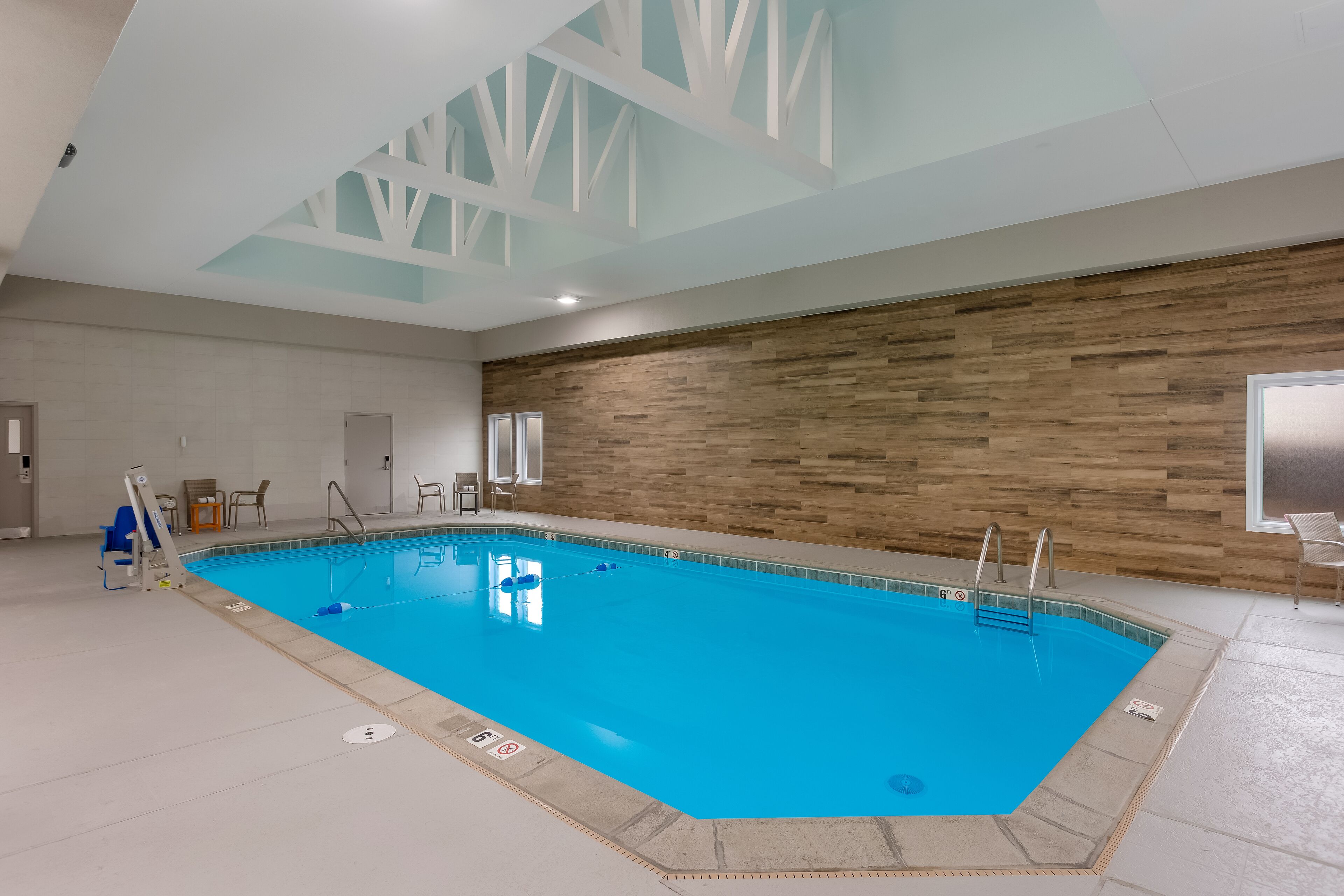 indoor pool, open 9:00 am to 9:00 pm, pool loungers