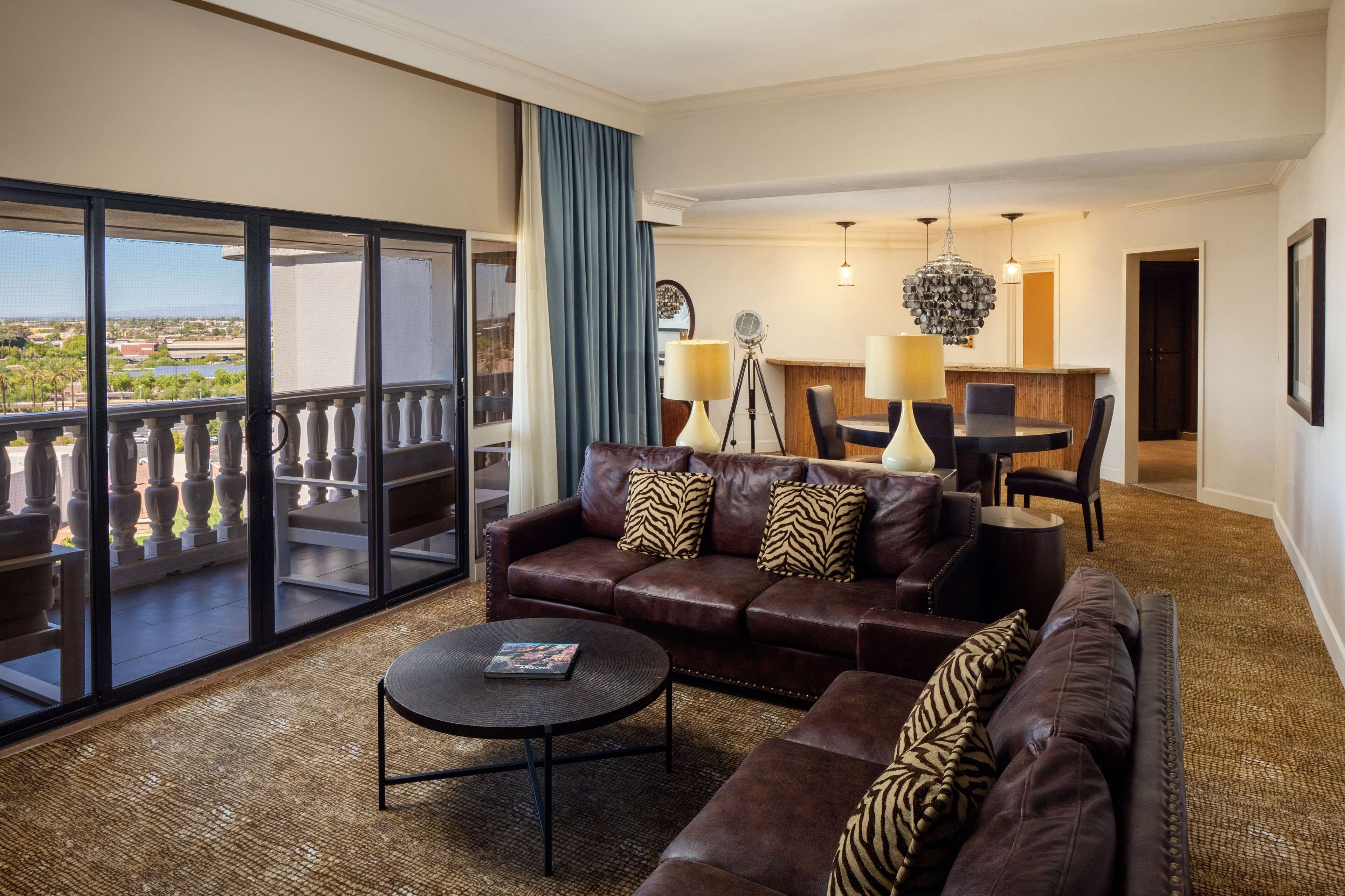 presidential suite, 1 king bed | living area | 50-inch smart tv with cable channels, tv, pay films