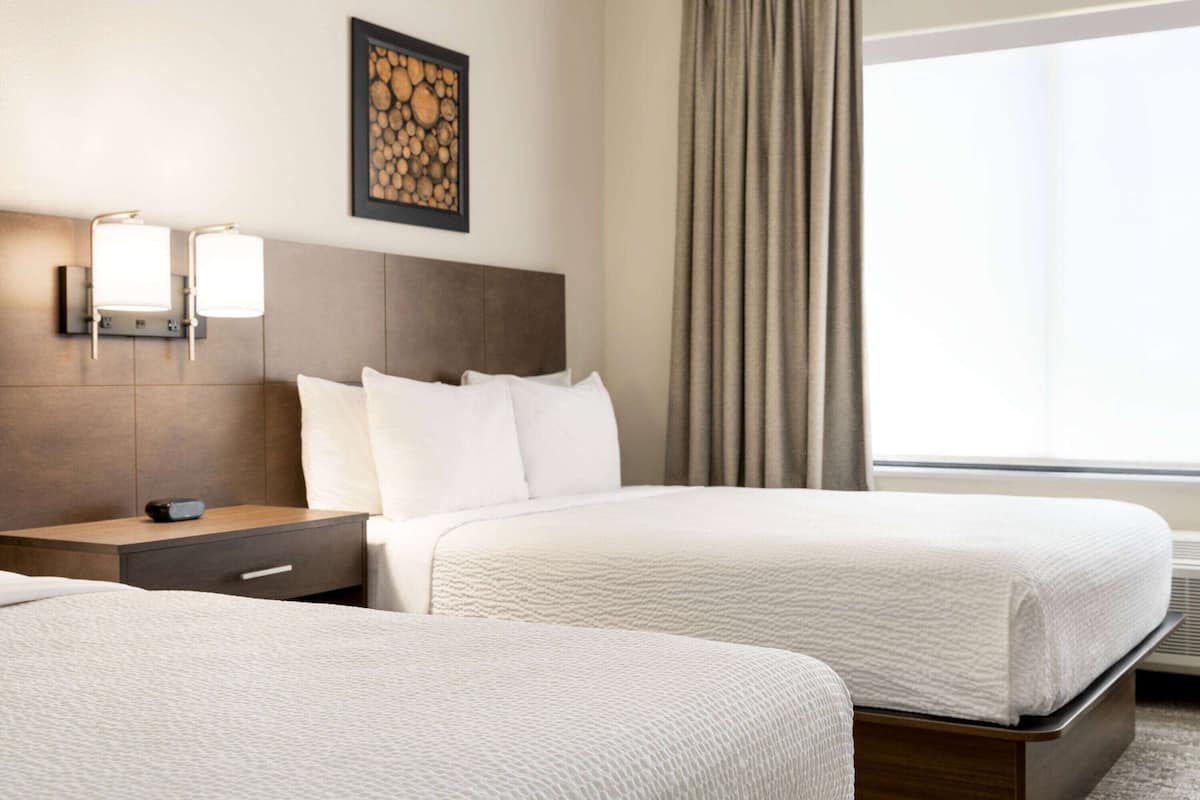 Premium bedding, down duvets, pillow-top beds, in-room safe