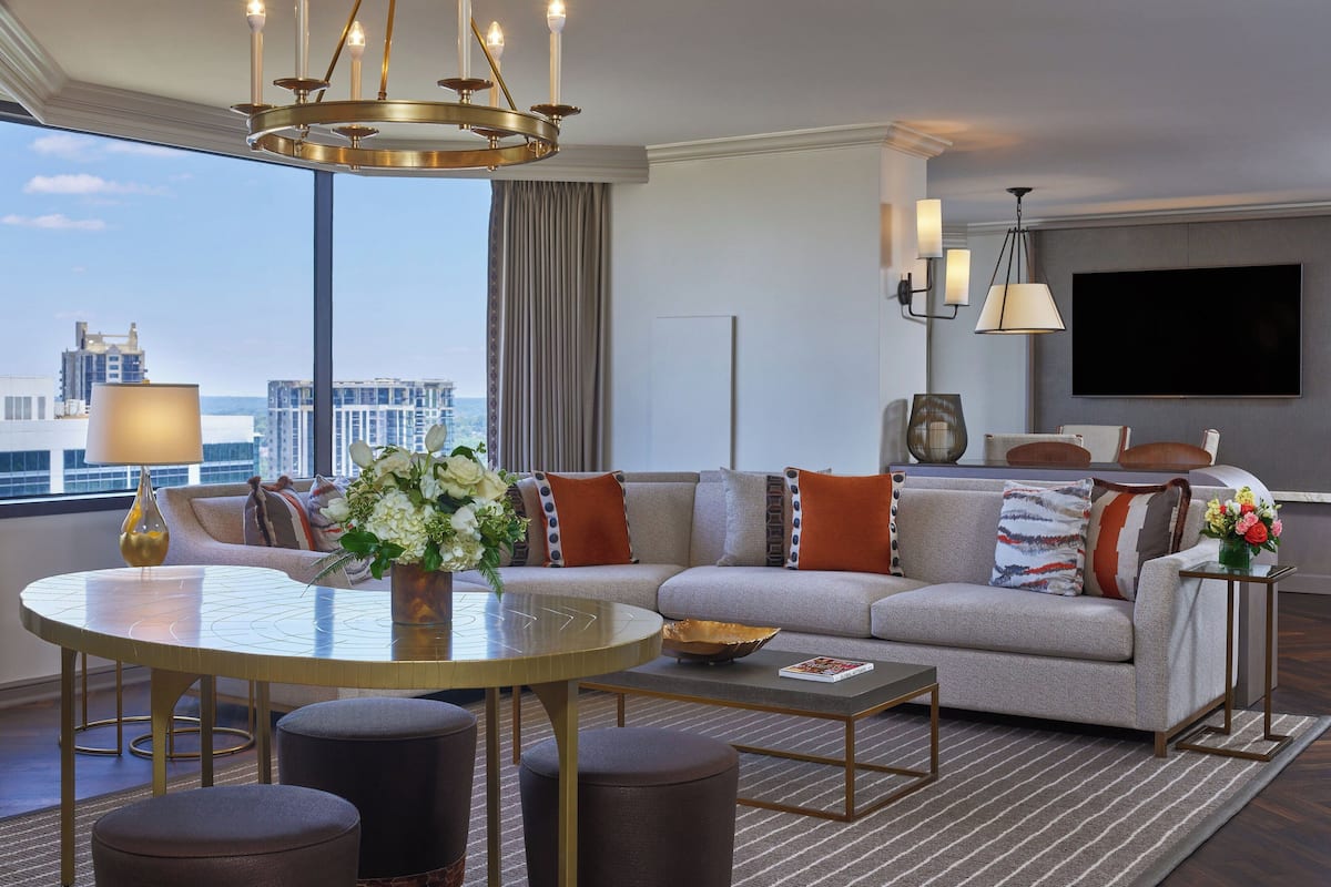 Suite, 1 Bedroom, Non Smoking (View) | Living room | Flat-screen TV, DVD player, pay movies