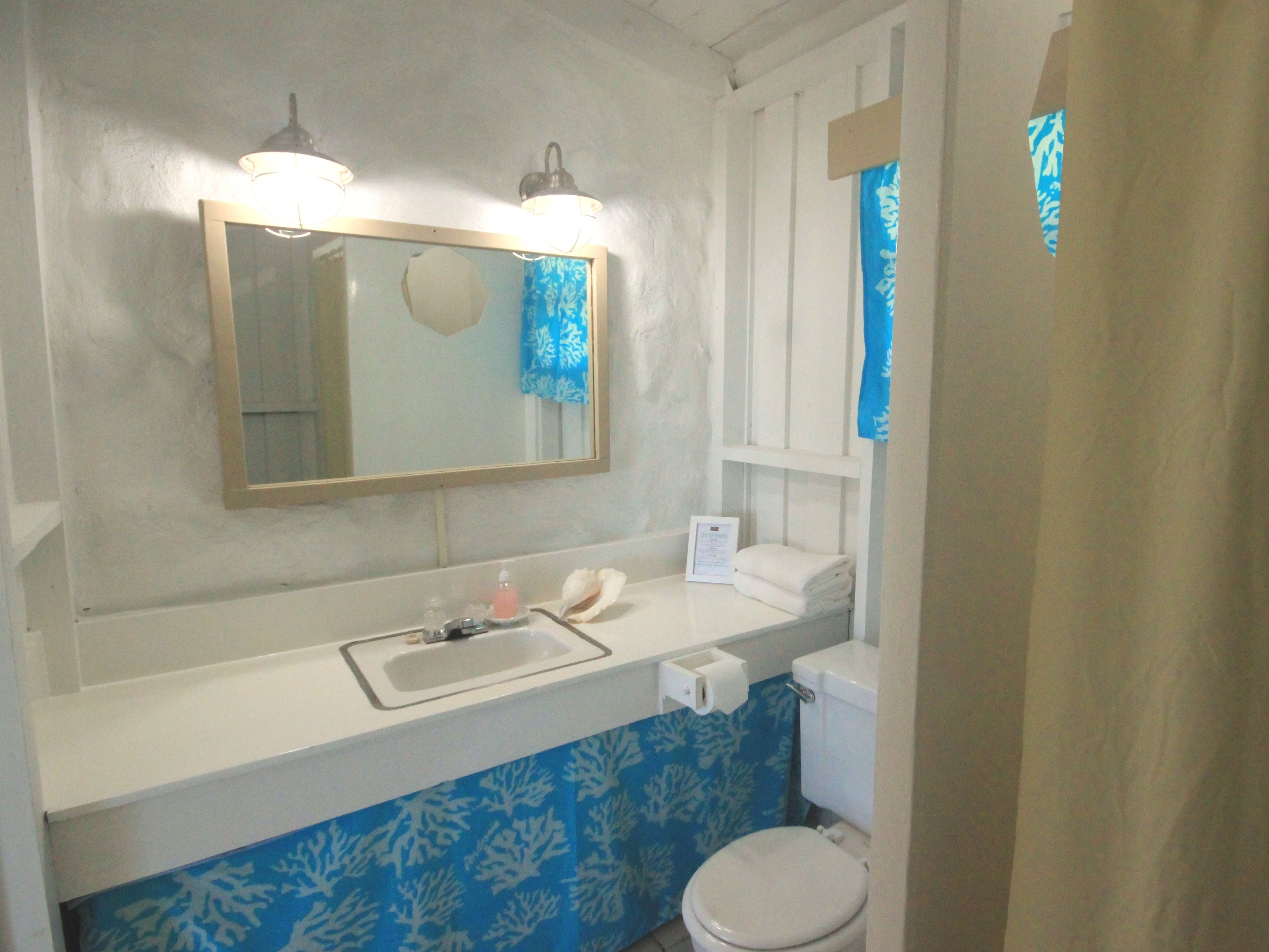 standard room, private bathroom | bathroom | eco-friendly toiletries, towels