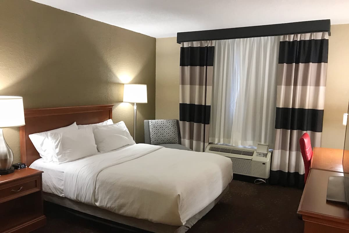 Premium bedding, desk, blackout drapes, iron/ironing board