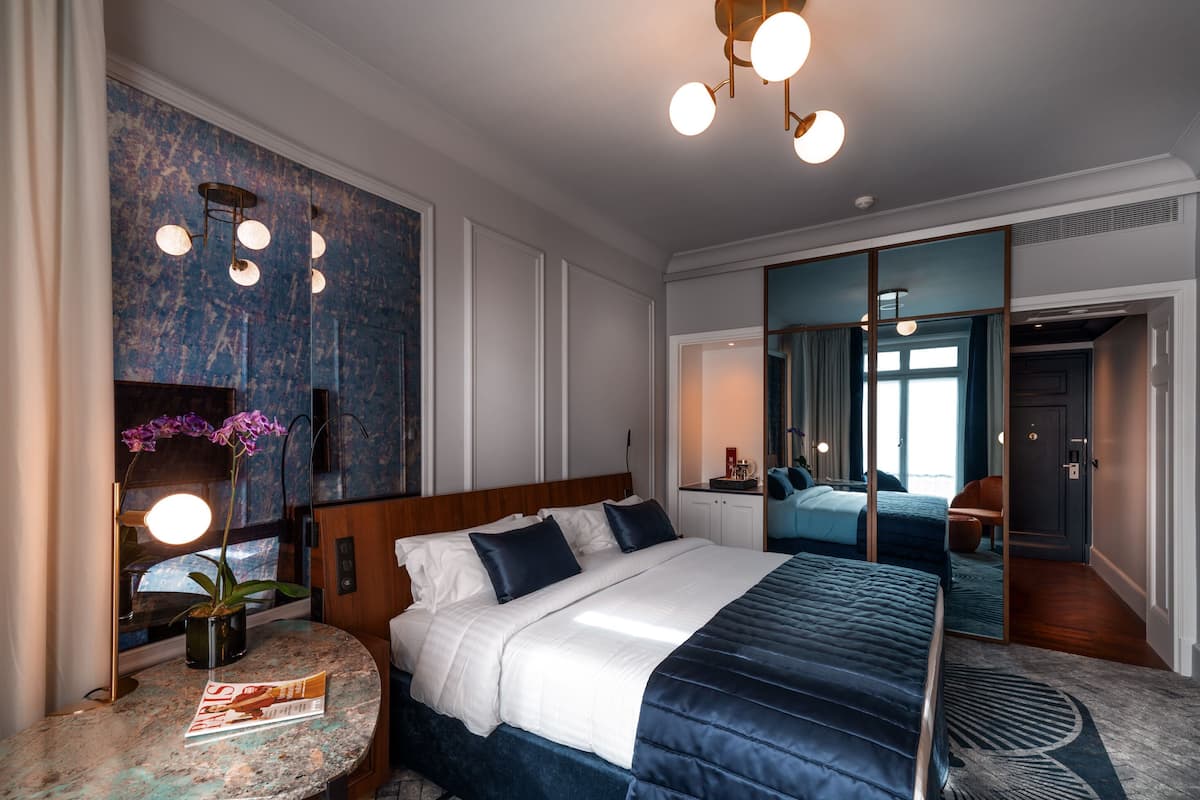 Premium bedding, down duvets, memory-foam beds, in-room safe