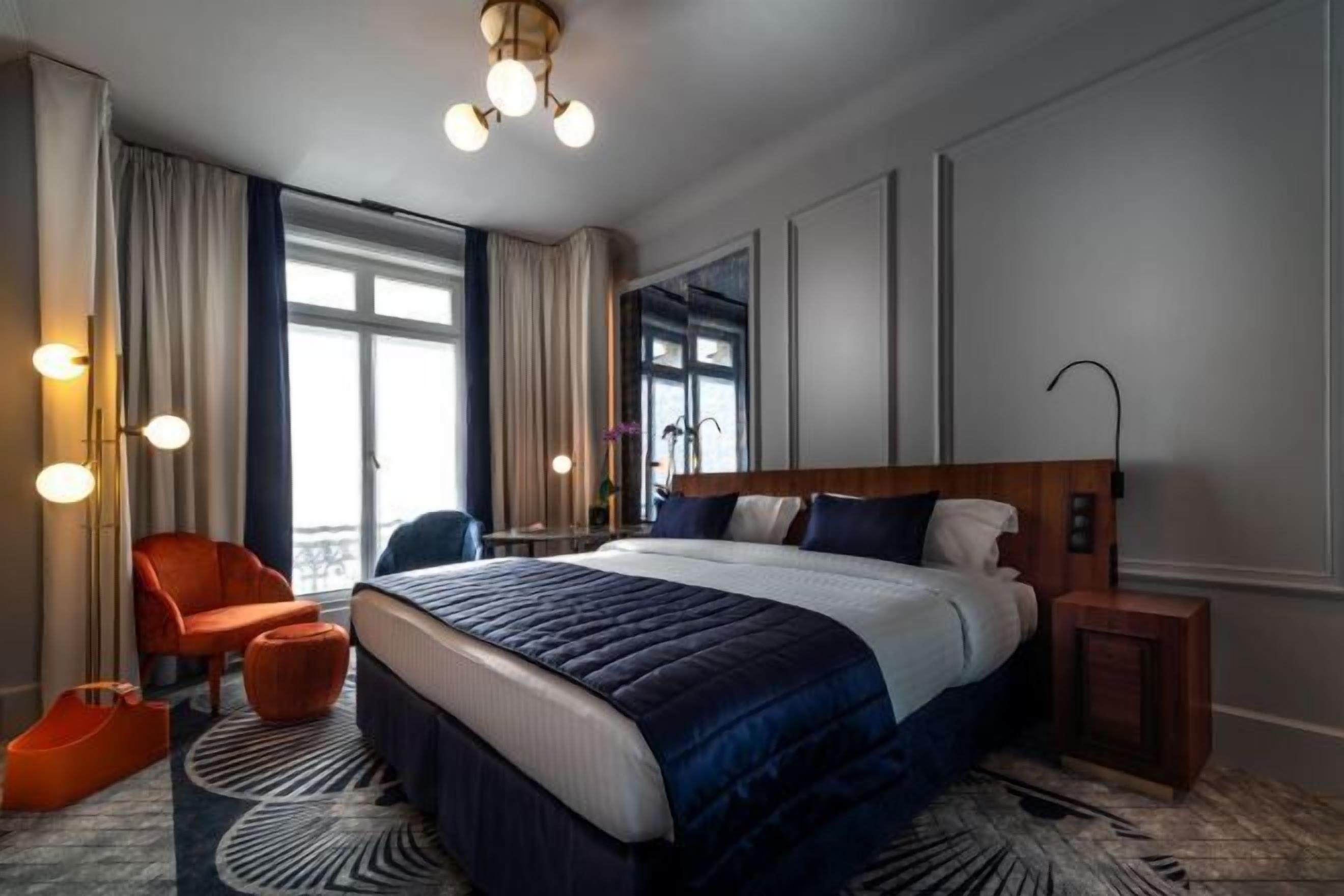 Premium bedding, down duvets, memory-foam beds, in-room safe