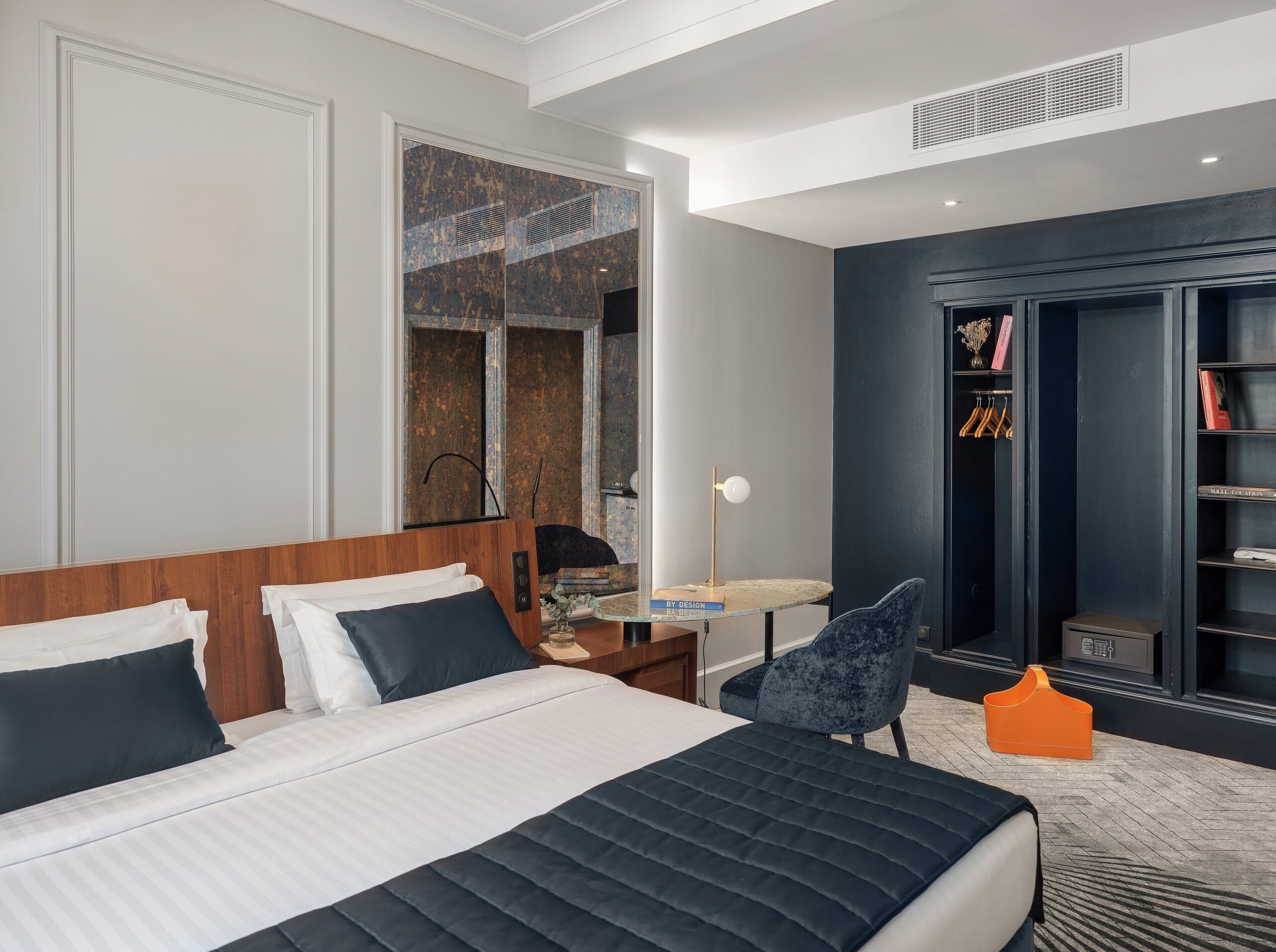 Premium bedding, down comforters, memory foam beds, in-room safe