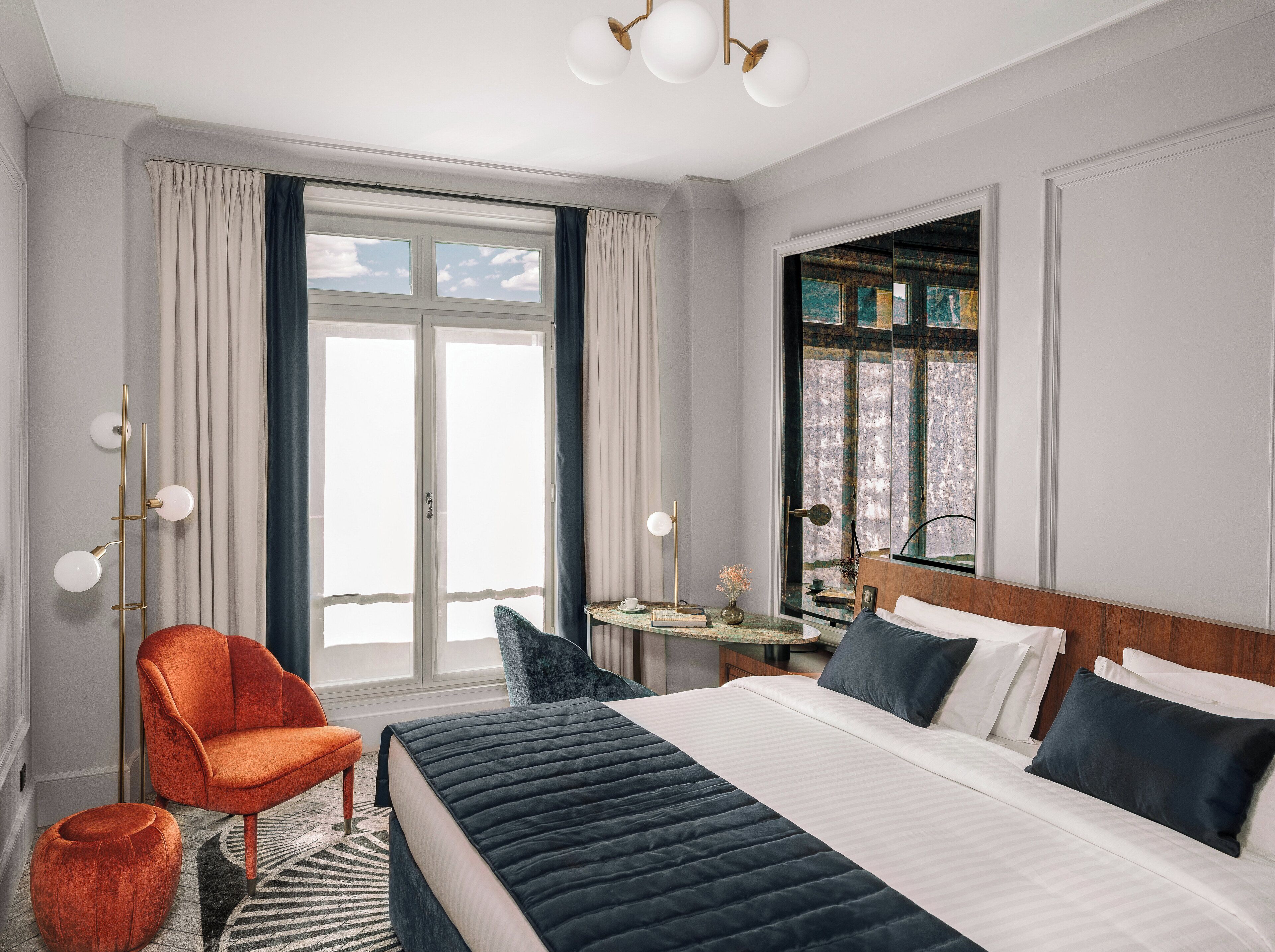 Premium bedding, down comforters, memory foam beds, in-room safe