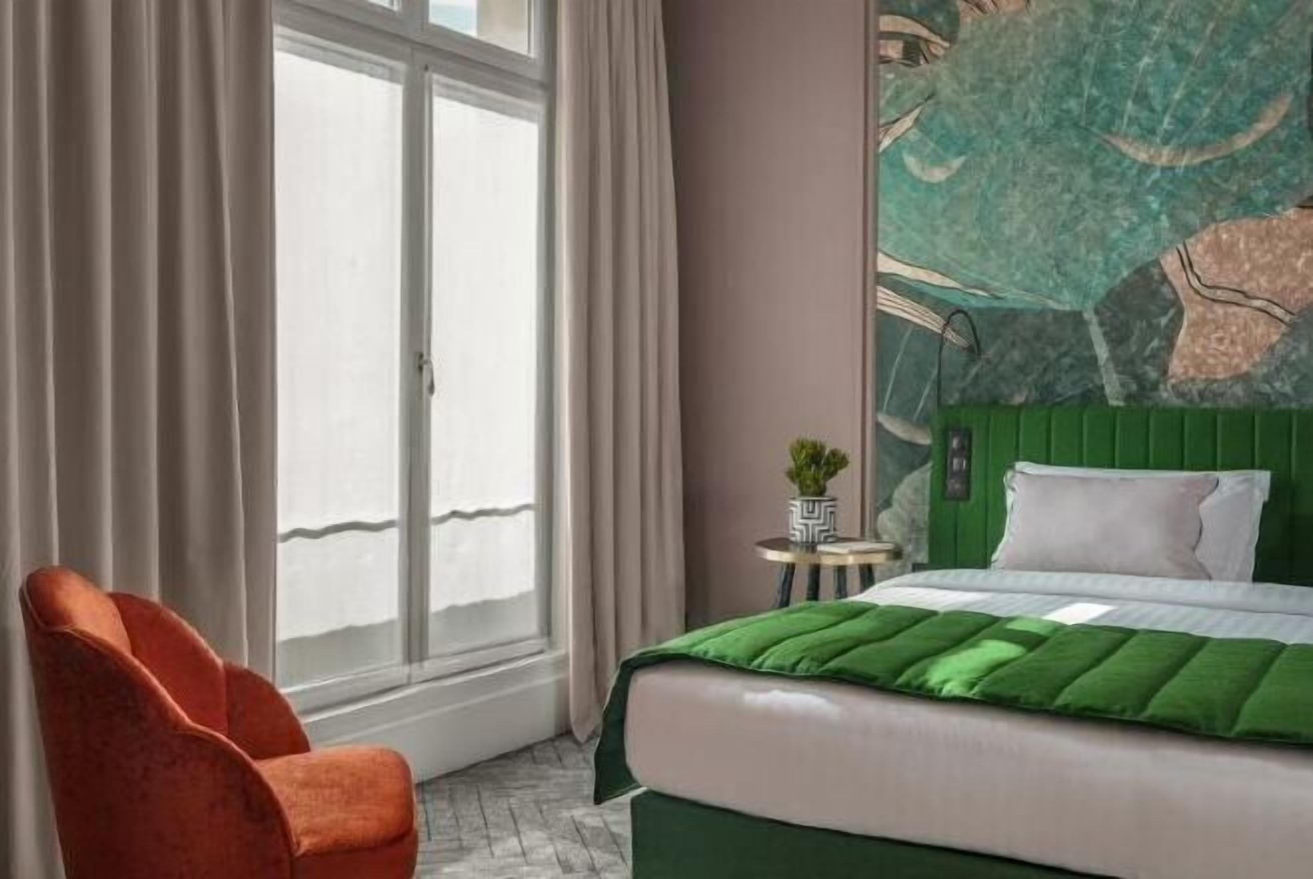 Premium bedding, down duvets, memory-foam beds, in-room safe