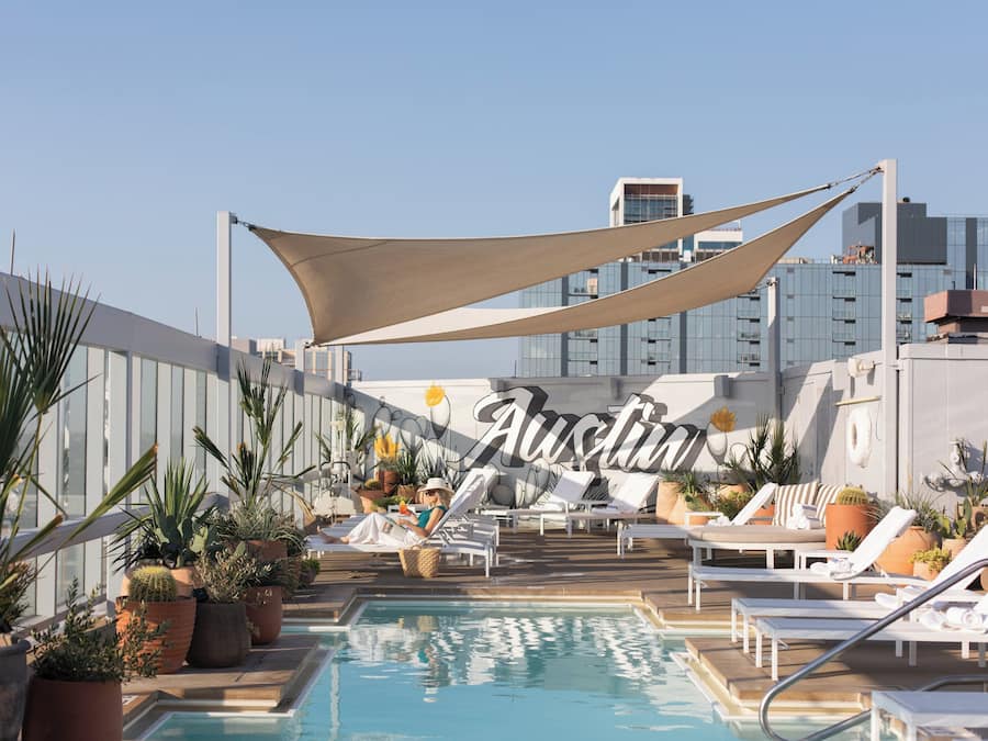 Outdoor pool, open 6:00 AM to 10:00 PM, sun loungers