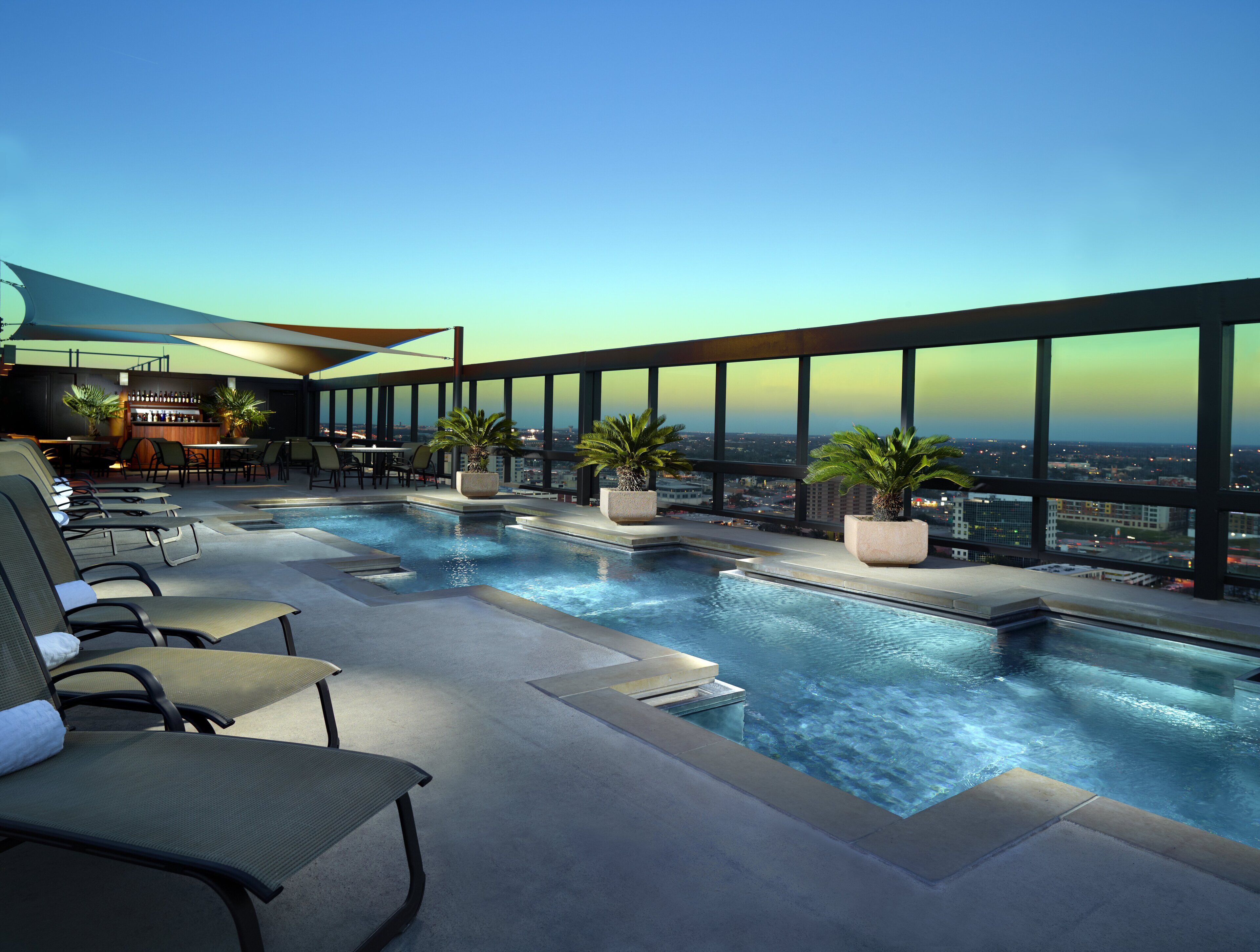 Outdoor pool, open 6:00 AM to 10:00 PM, sun loungers