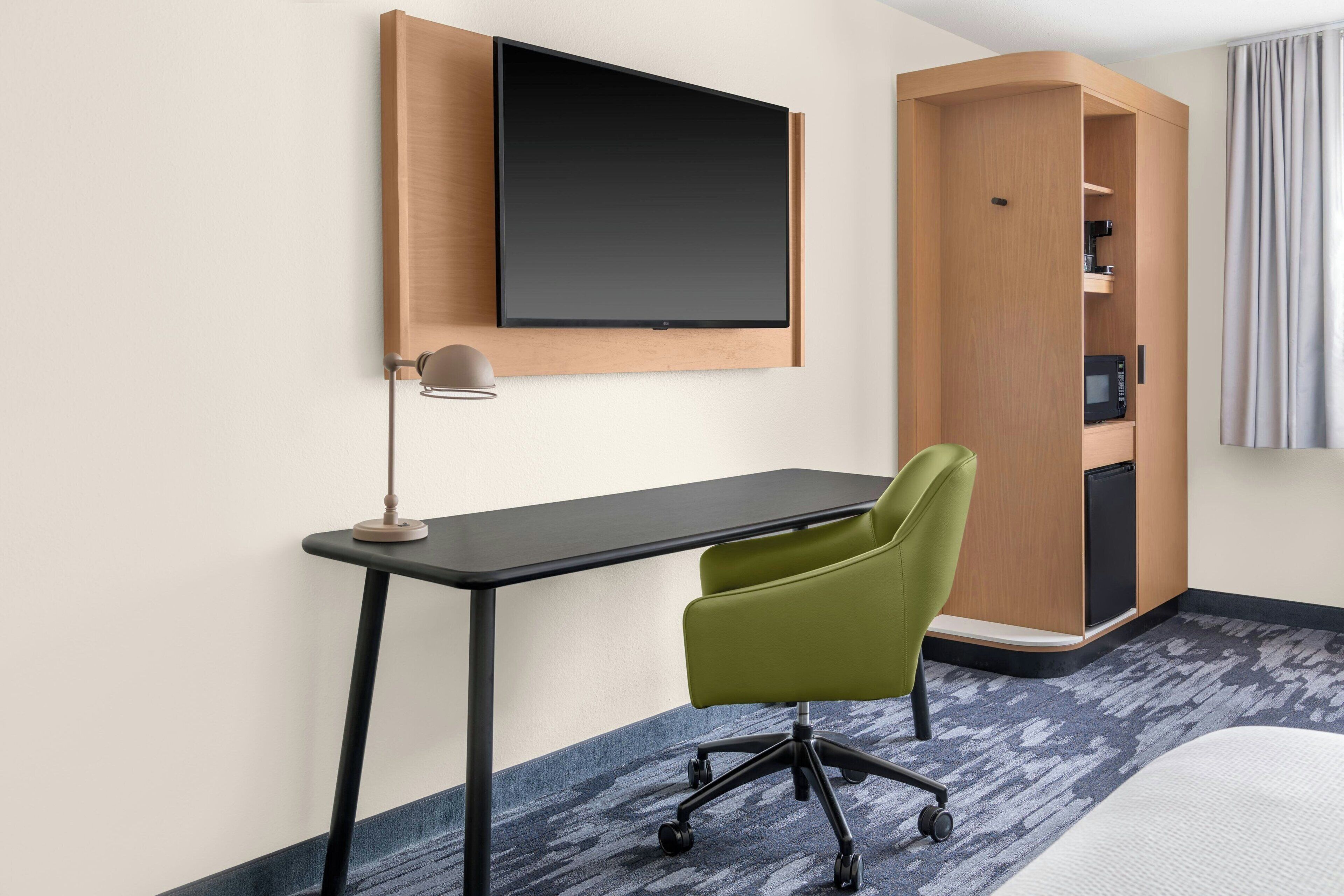 premium bedding, desk, blackout curtains, iron/ironing board