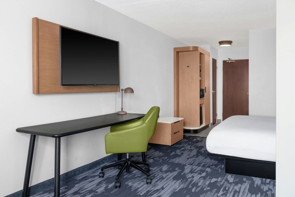 Premium bedding, desk, blackout curtains, iron/ironing board