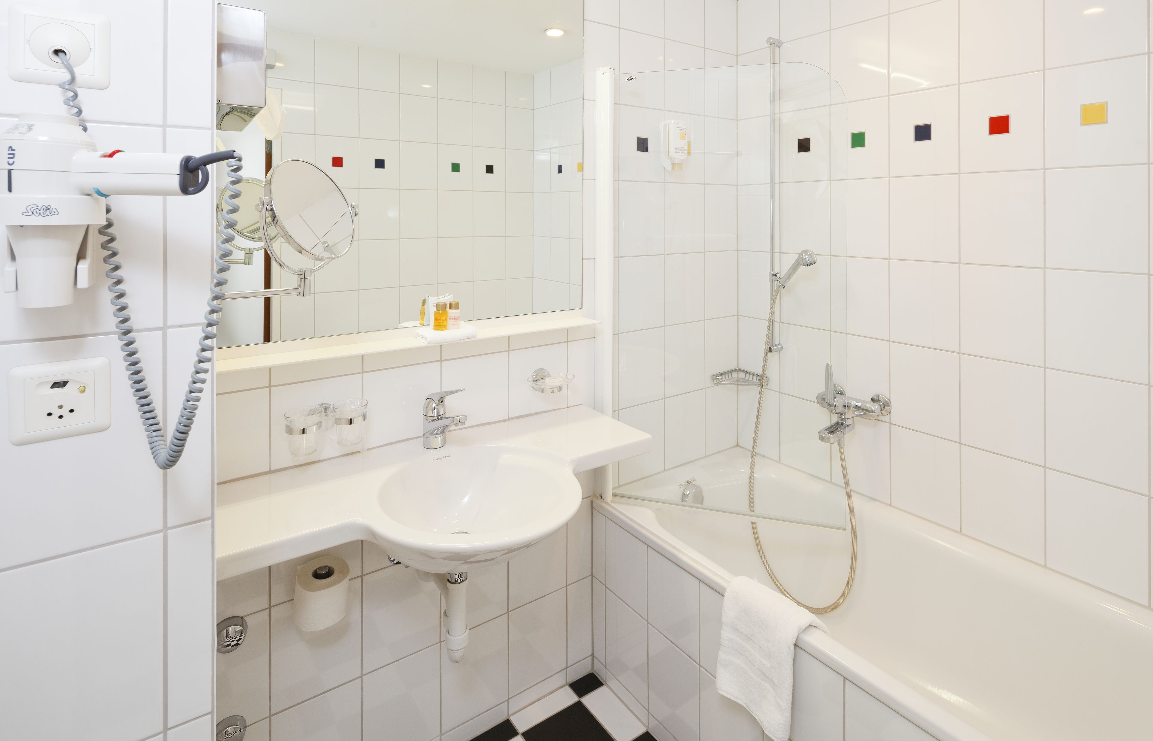 free toiletries, hair dryer, slippers, towels