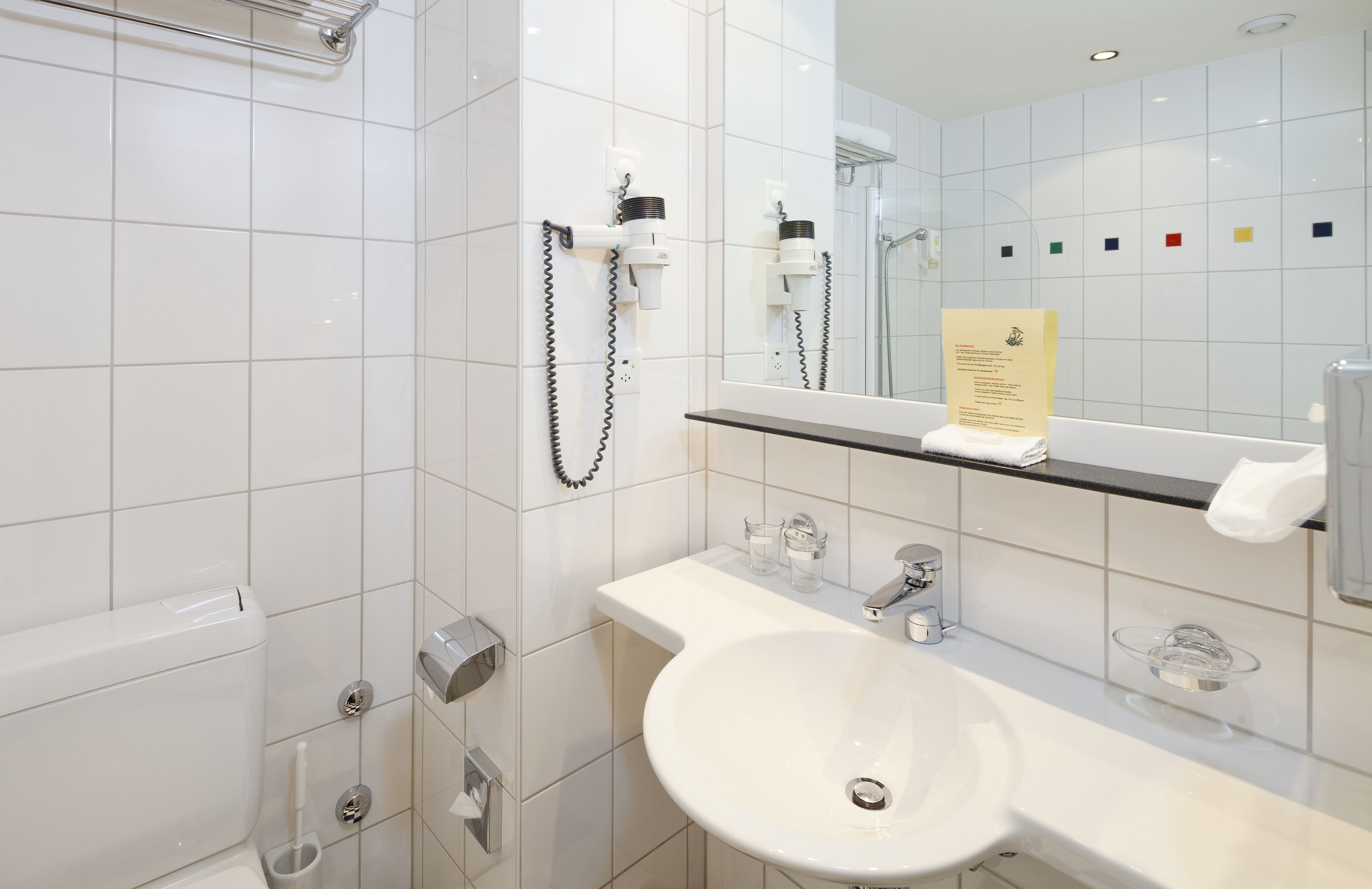 economy single room | bathroom | free toiletries, hair dryer, slippers, towels