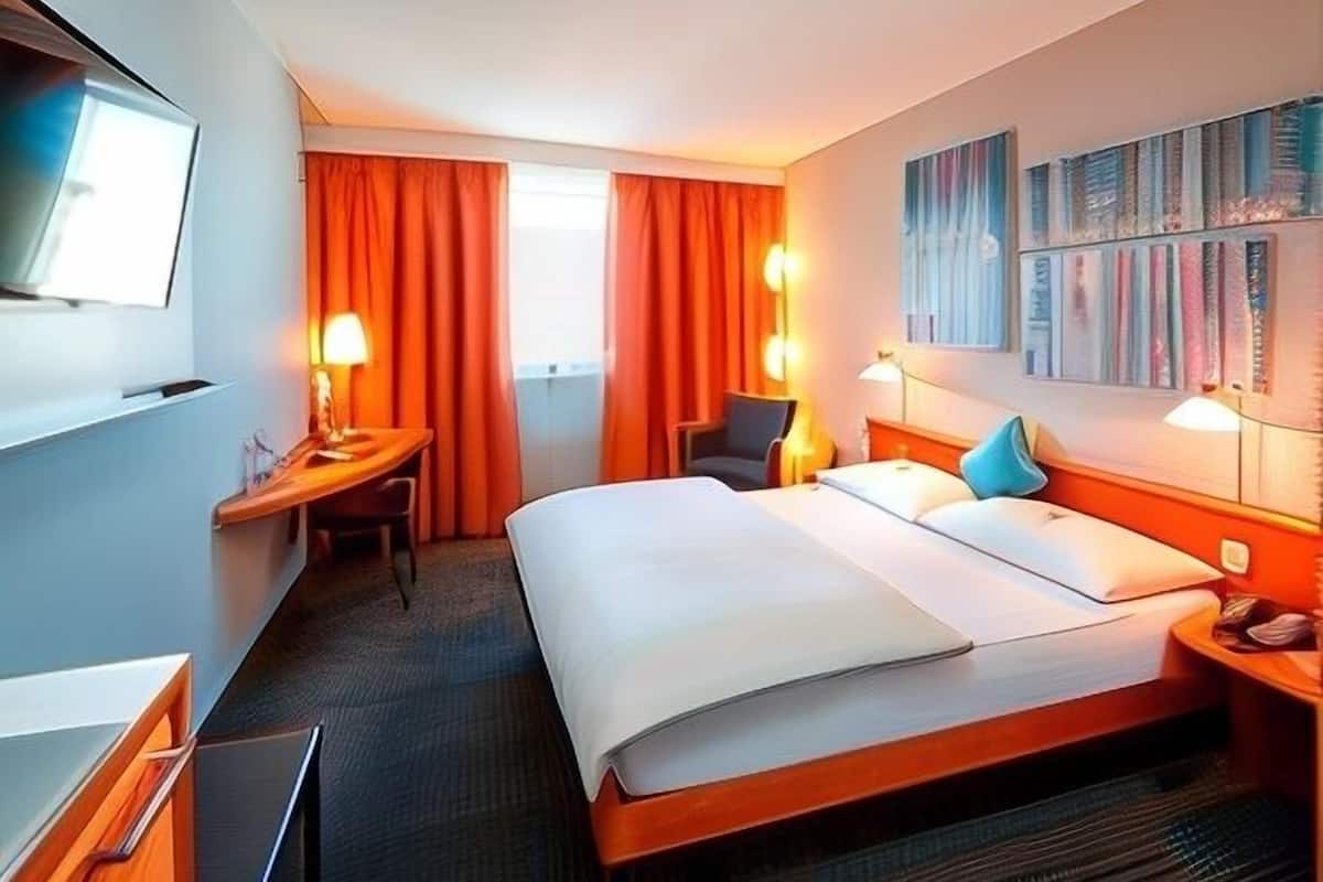 Memory-foam beds, in-room safe, desk, laptop workspace