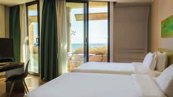 Deluxe Room, 2 Single Beds, Balcony, Sea View | Down duvets, minibar, in-room safe, desk