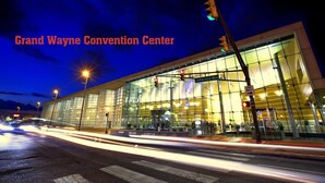 The Grand Wayne Convention Center at night with a modern glass facade and illuminated signage. - Hilton Fort Wayne at the Grand Wayne Convention Center (Fort Wayne)
