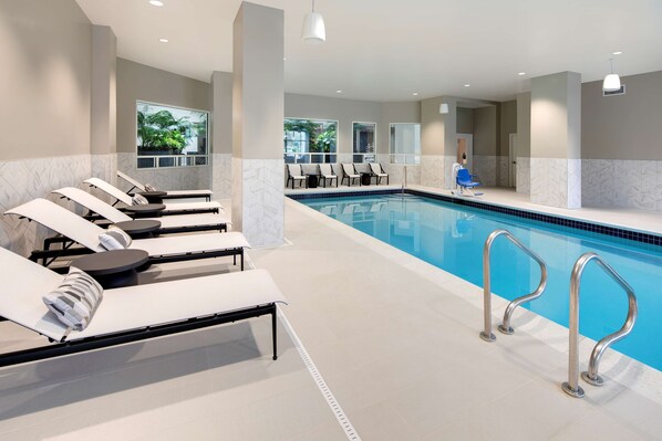 Indoor pool, open 6:00 AM to 11:00 PM, pool loungers