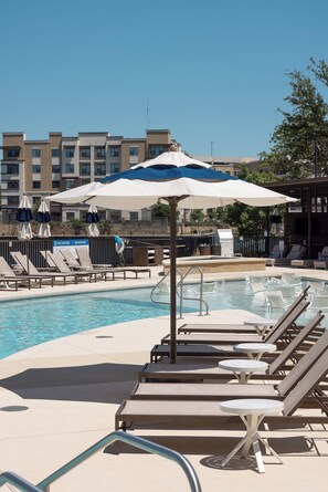Outdoor pool, open 6:00 AM to 10:00 PM, pool cabanas (surcharge)